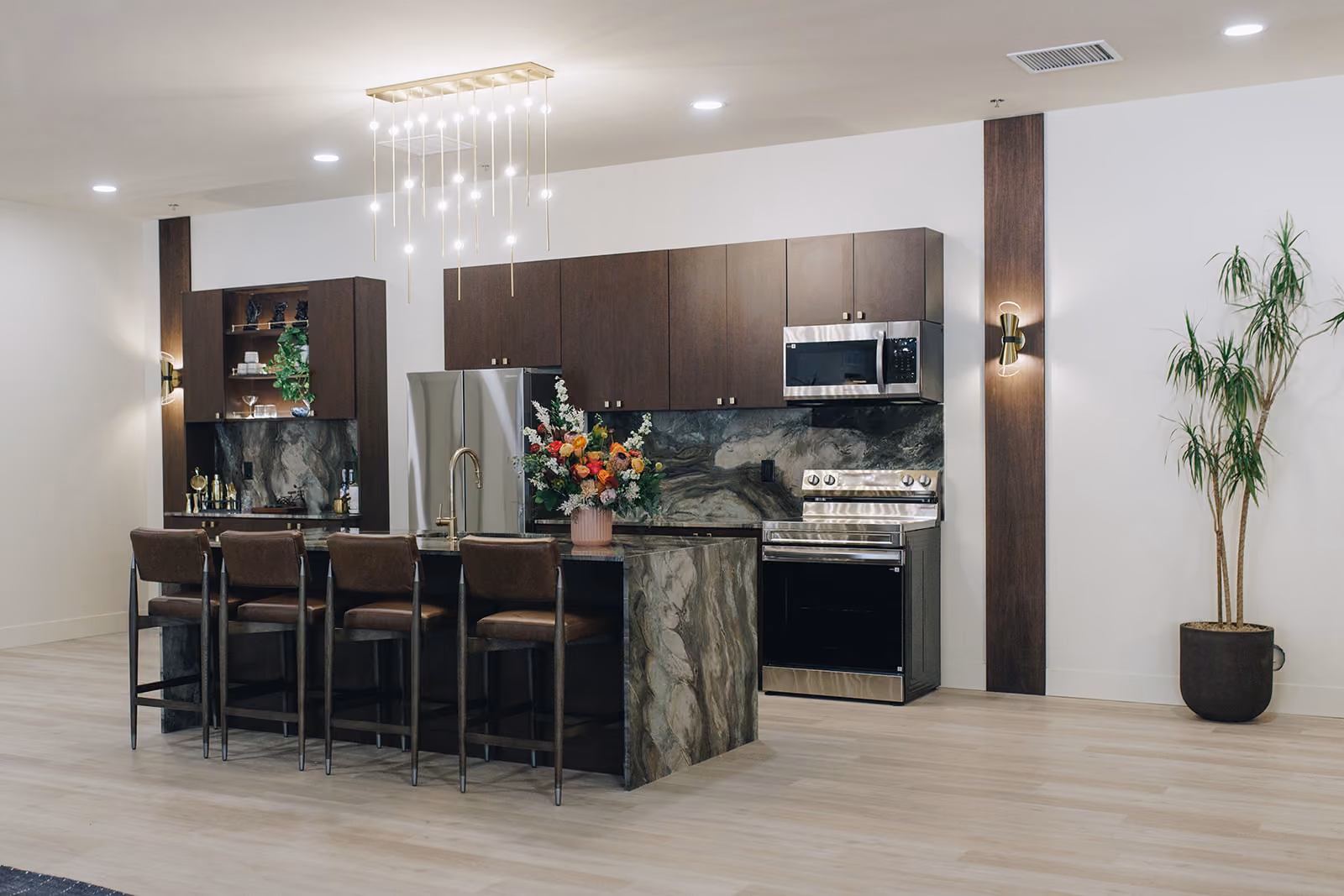 Leasing office lounge with dark accents and modern furniture