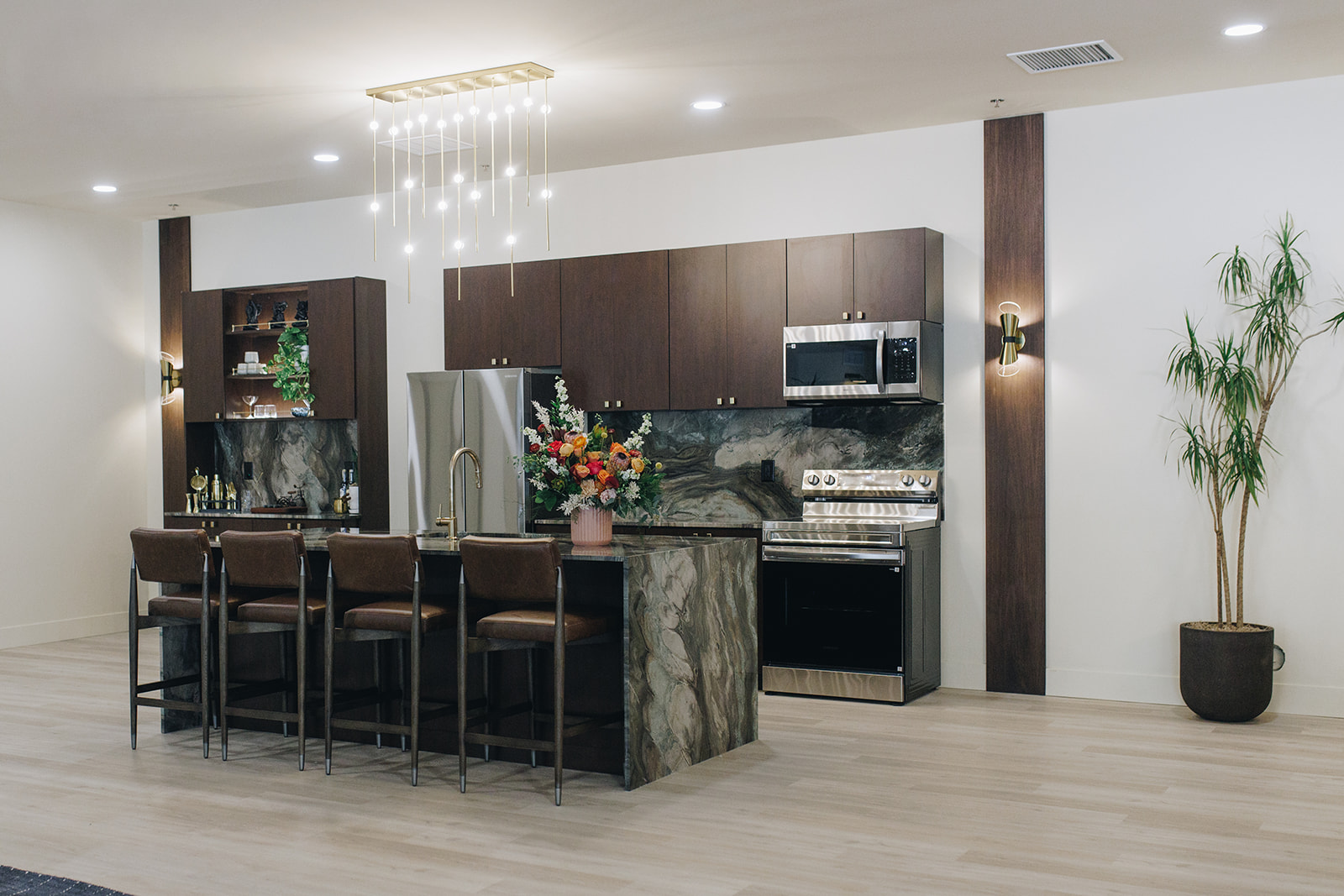 Leasing office lounge with dark accents and modern furniture