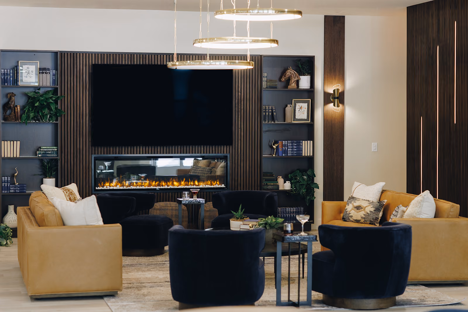 Leasing office lounge with dark accents and modern furniture