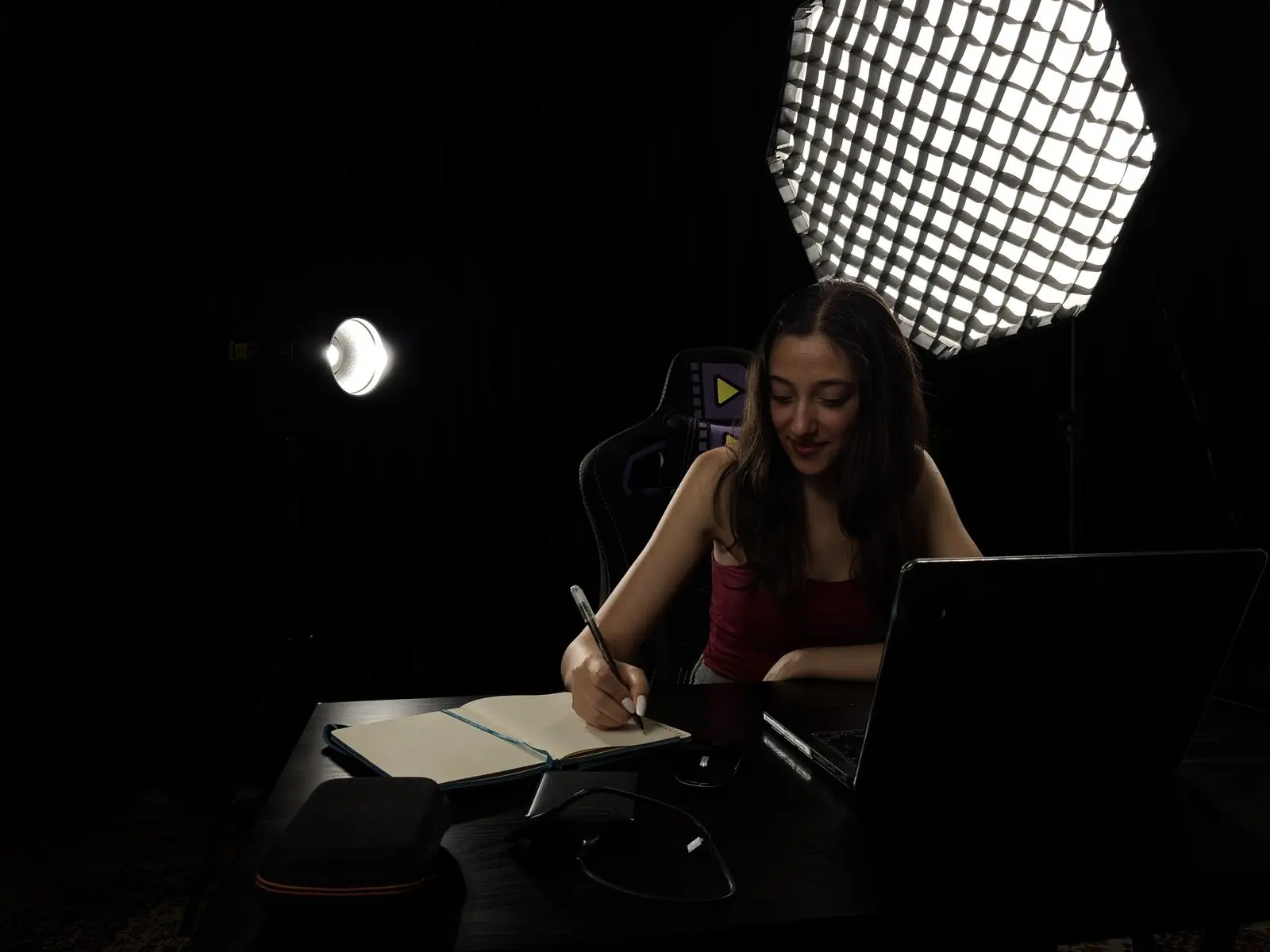 Kubra writing a project scope by hand
