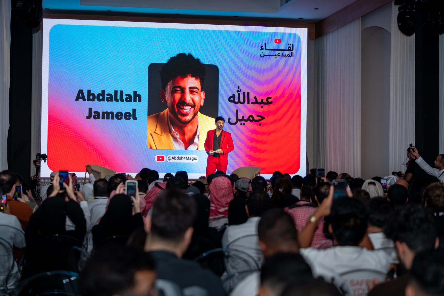 Abdullah Jamil hosting YouTube Creator Collective 2025 on stage