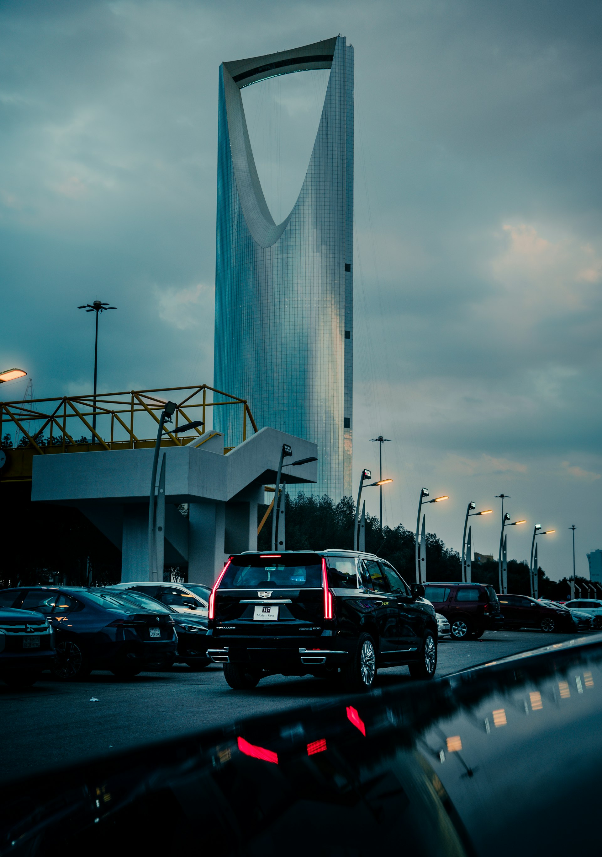 Cars driving near Kingdom Tower in Riyadh