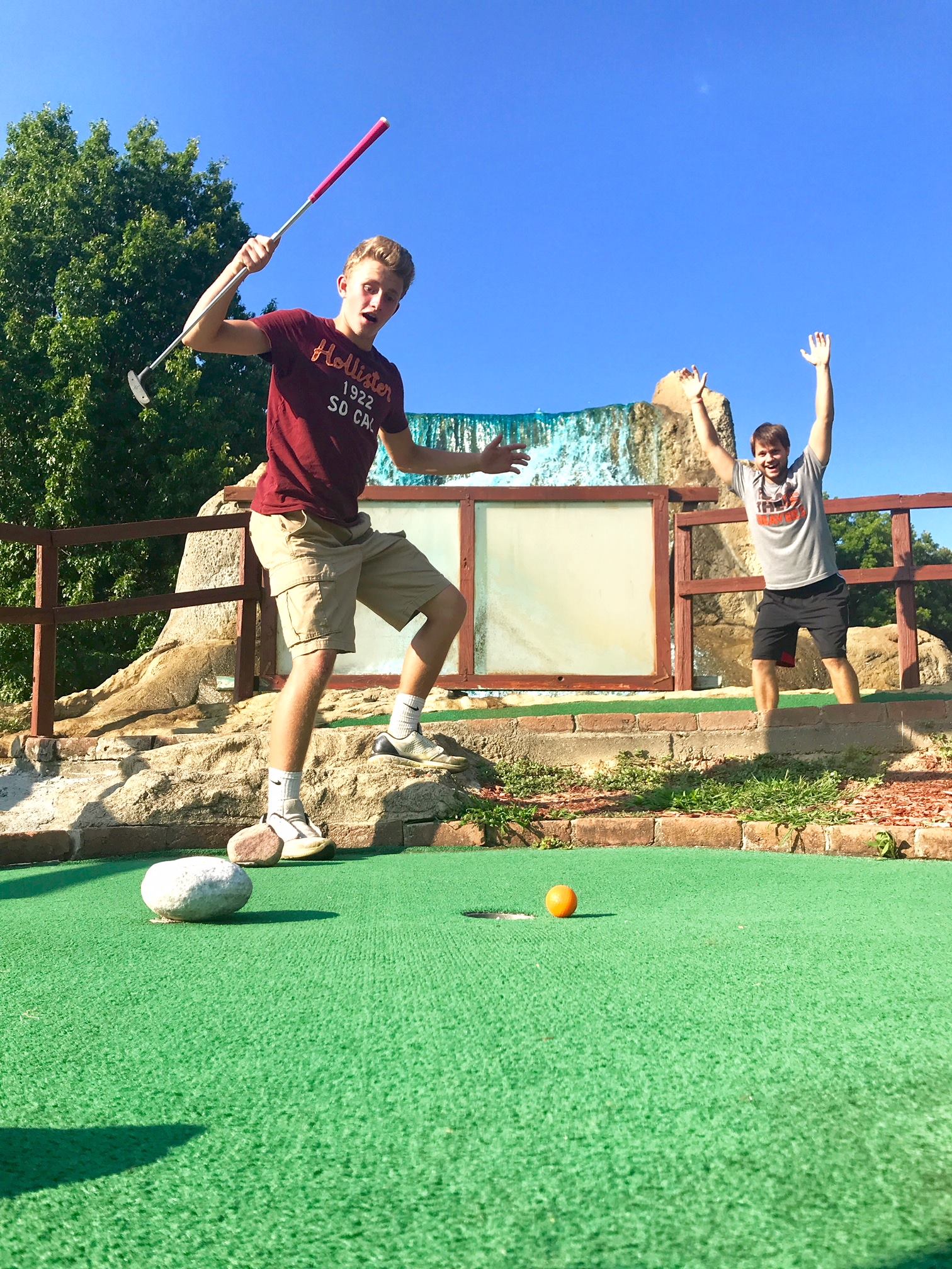 Kids playing mini golf at Lake Nepessing Golfland