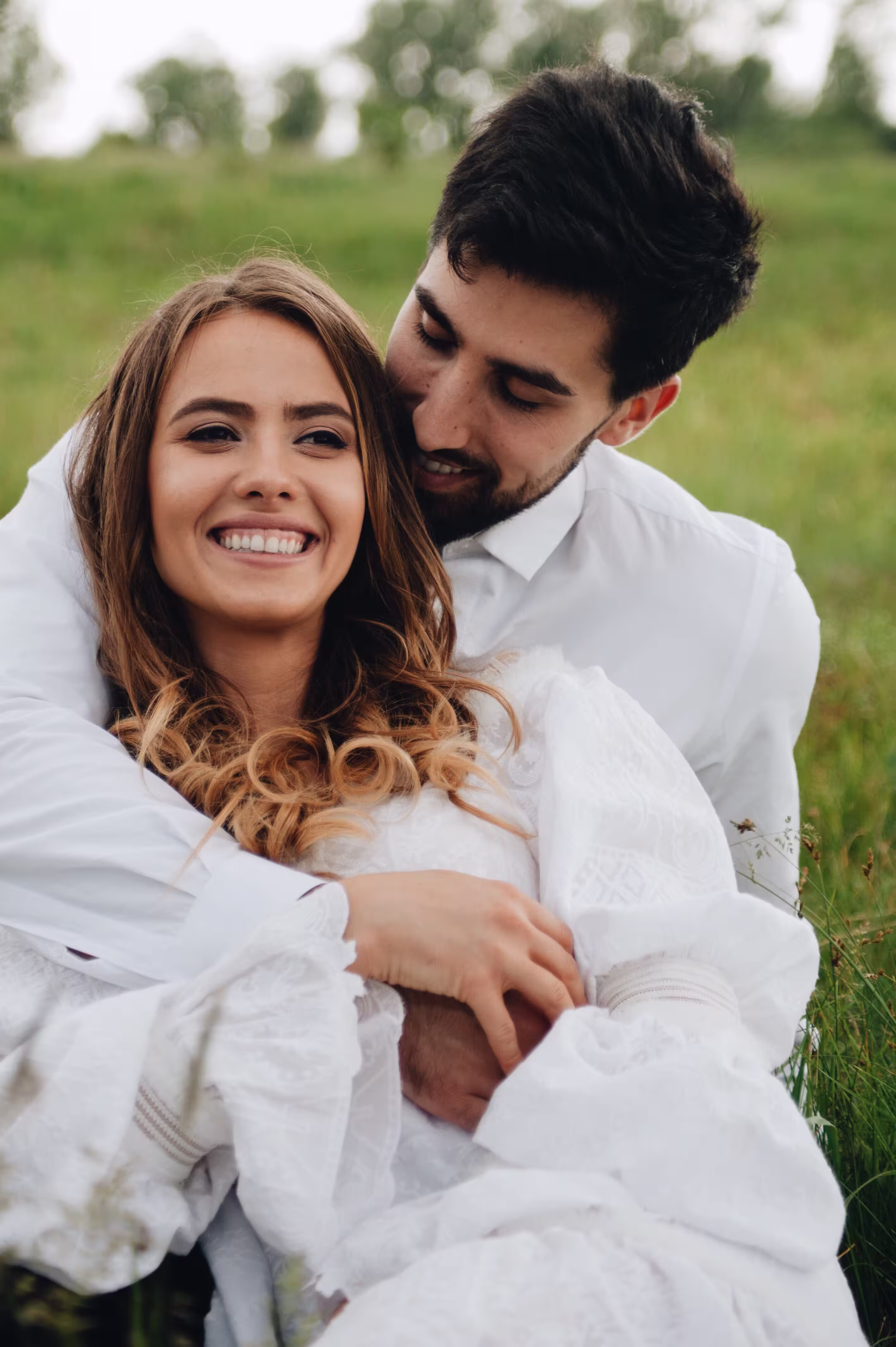Couple embracing outdoors, Schedule 3 waiver partner visa advice