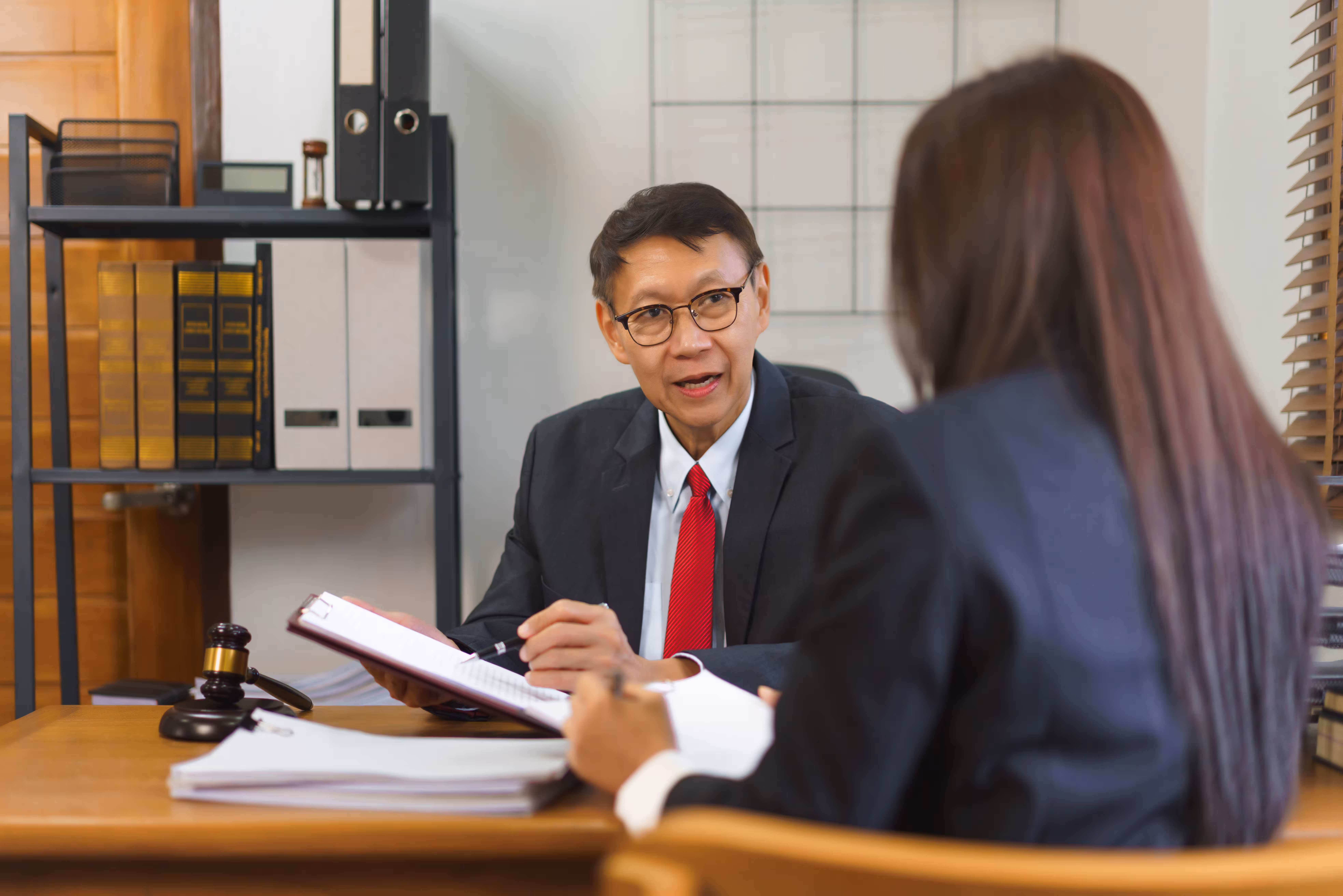 Lawyer meeting a client in a law office
