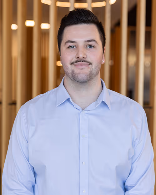 Portrait of Ben Sixsmith, Graphic Designer at Four Stripes.
