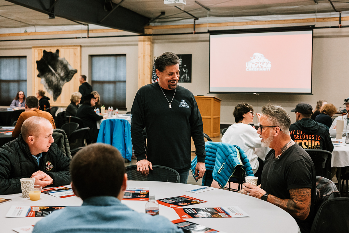 Friends connecting around the table at Vision Breakfast
