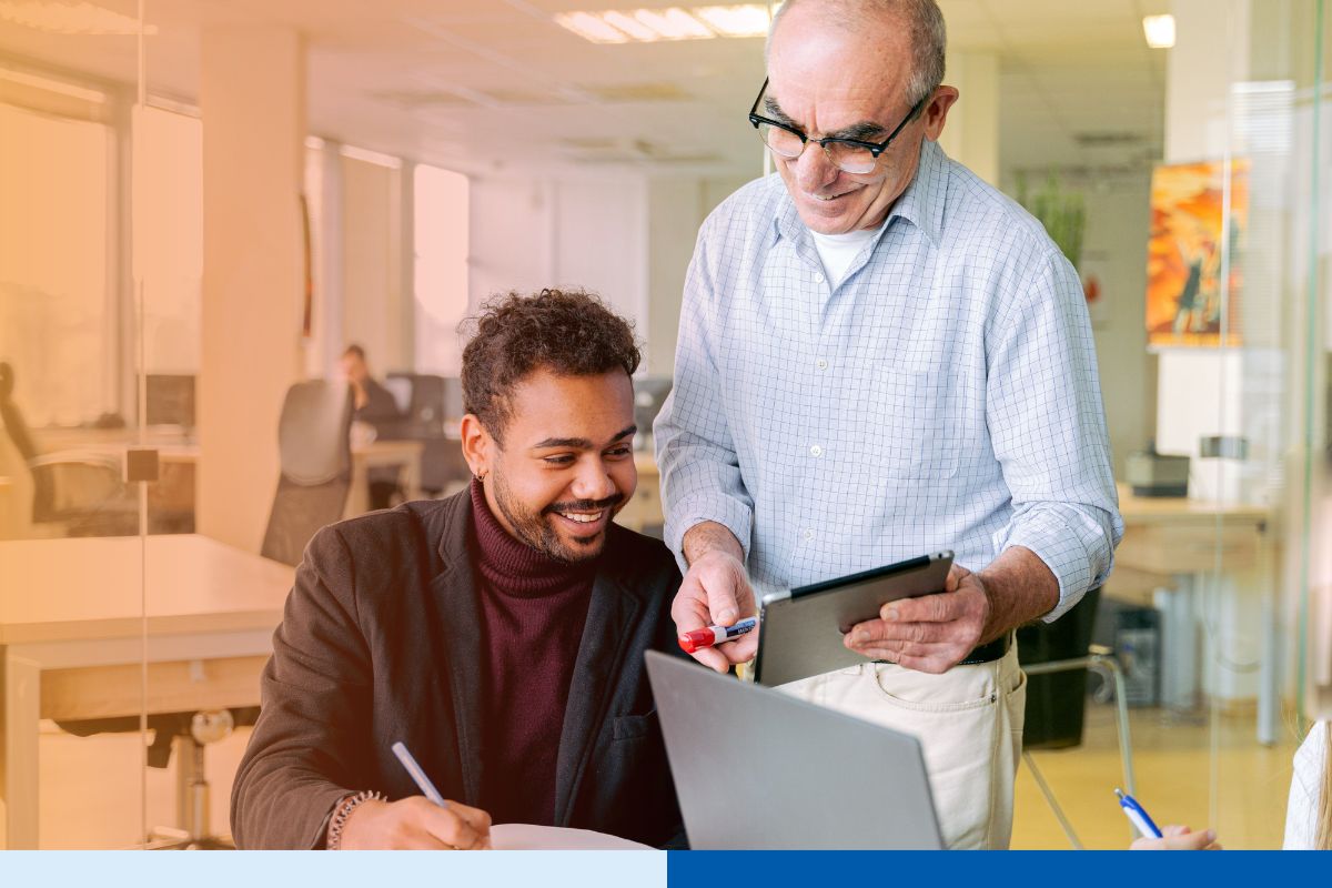 Employee shadowing an experienced mentor