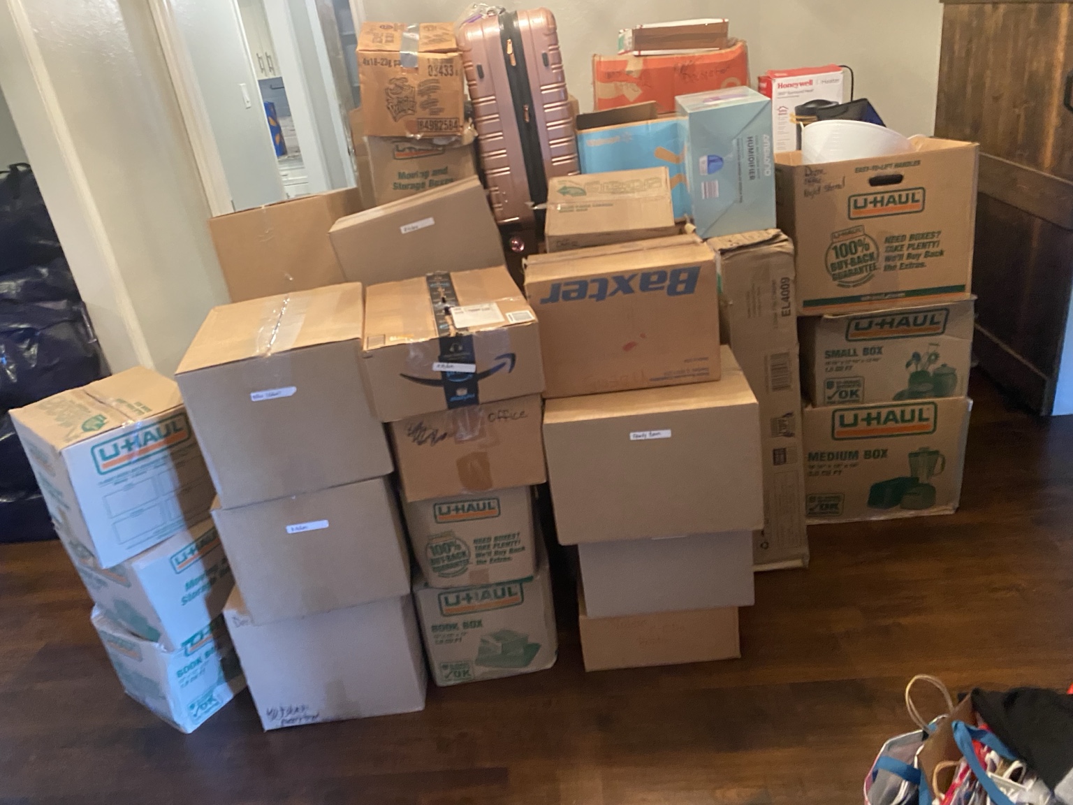 Boxes staged inside a home for a real Atlas move