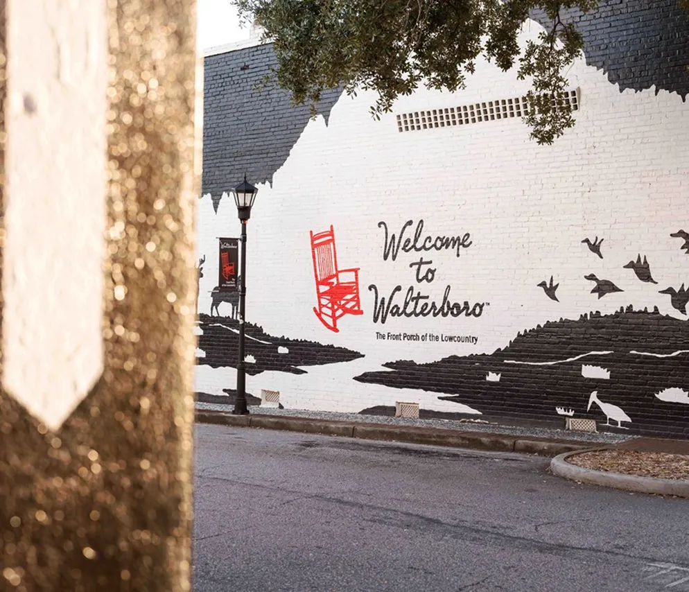 Welcome to Walterboro mural with rocking chair and Lowcountry wildlife