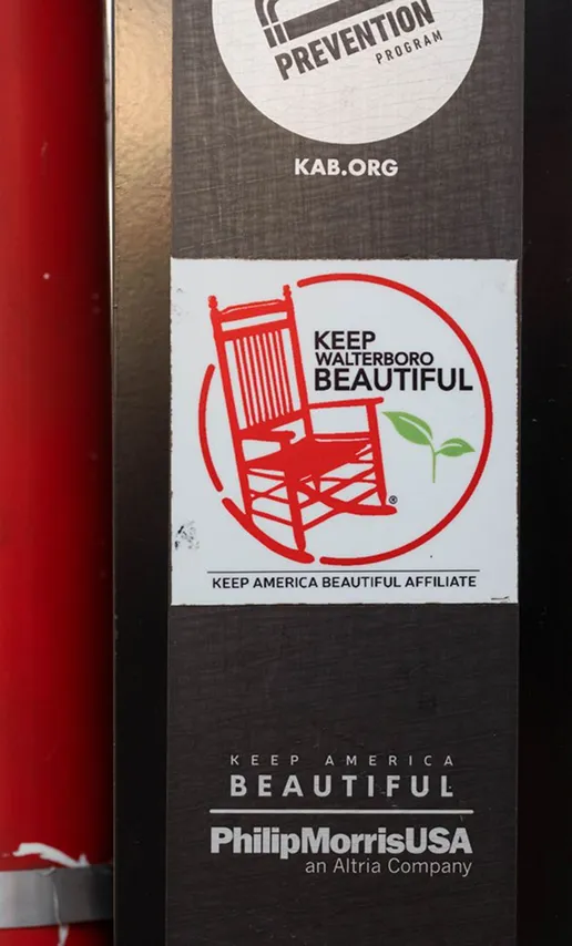 Keep Walterboro Beautiful sign with red rocking chair logo
