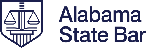 Logo of Alabama State Bar featuring scales of justice inside a shield.