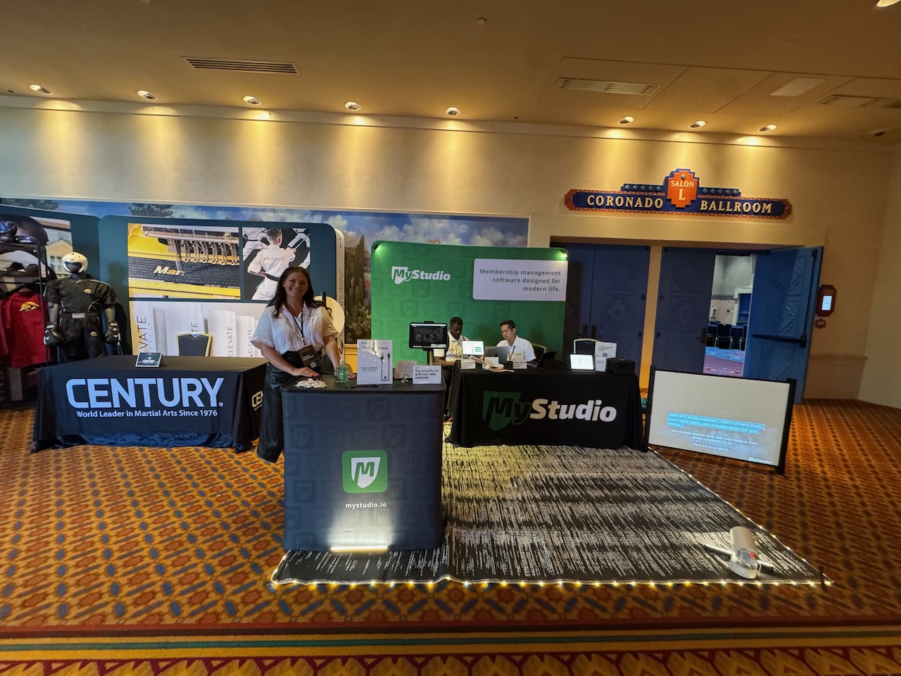 MyStudio and Century team members at their trade show booth