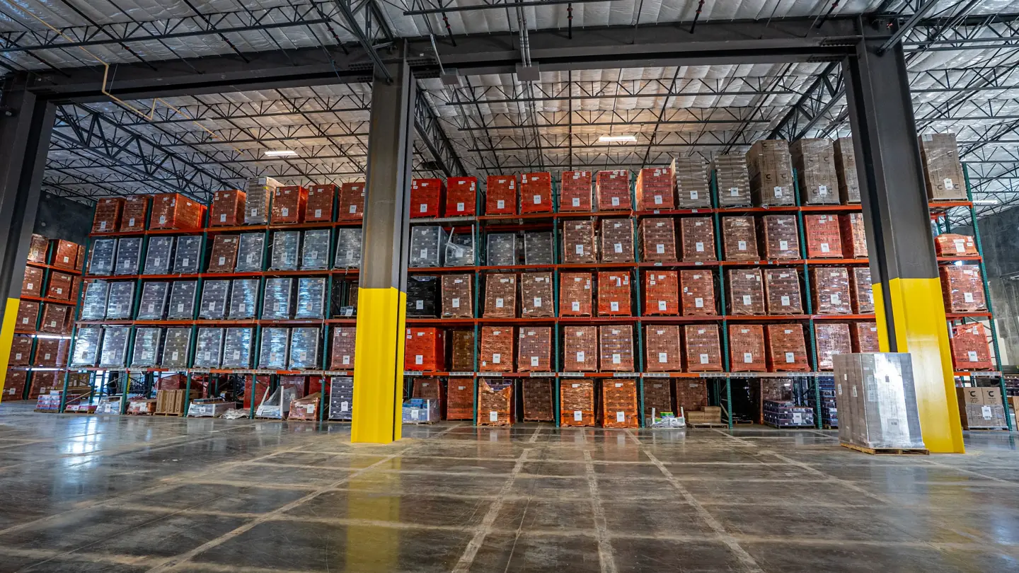 Beverage pallets stored on warehouse racks