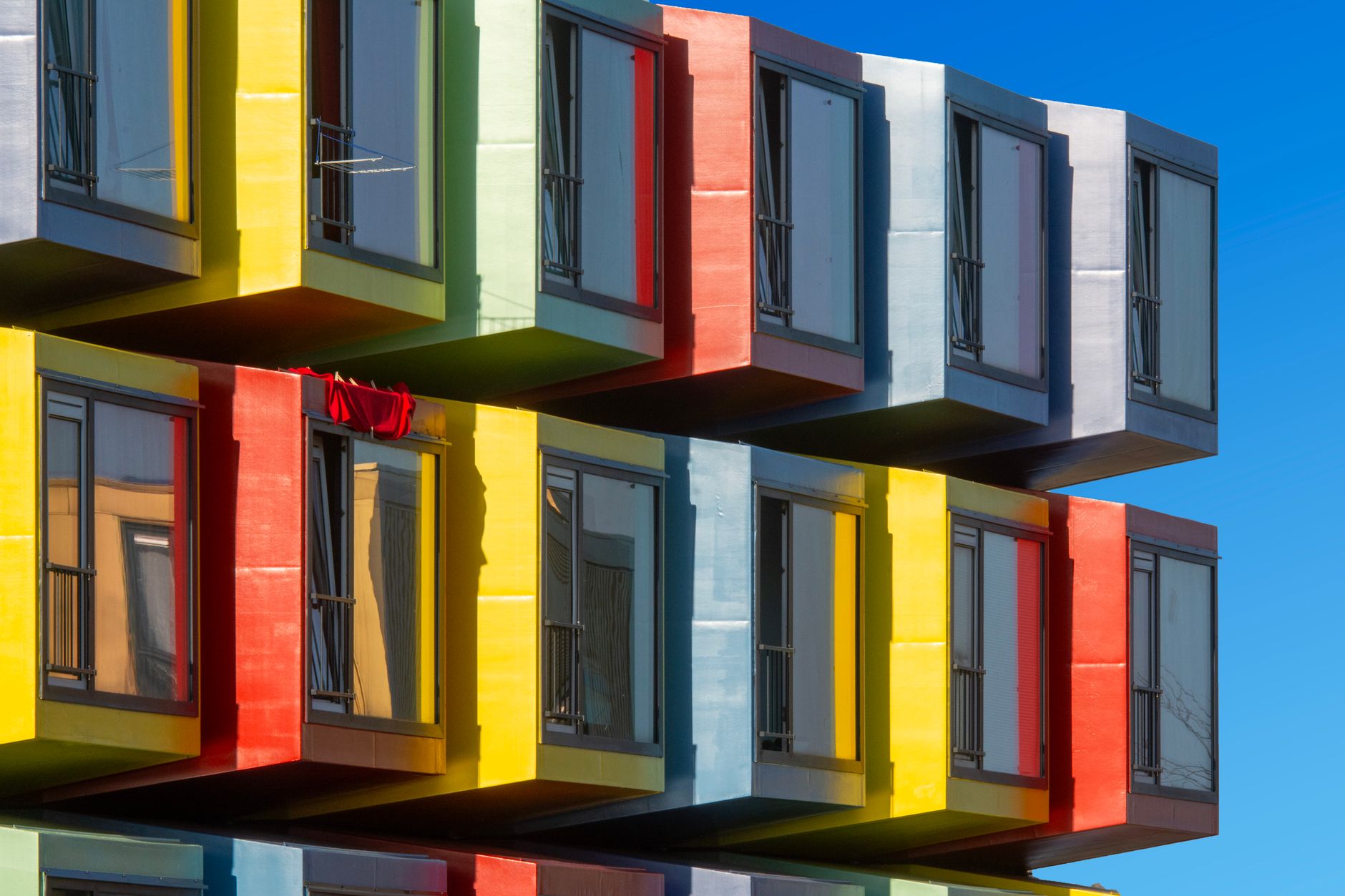 Minimal 3D render visualizing Structured Content Architecture for Answer Engines as stacked translucent layers with answer blocks and schema grid