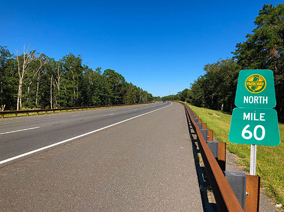 Garden State Parkway with mile marker sign and logo