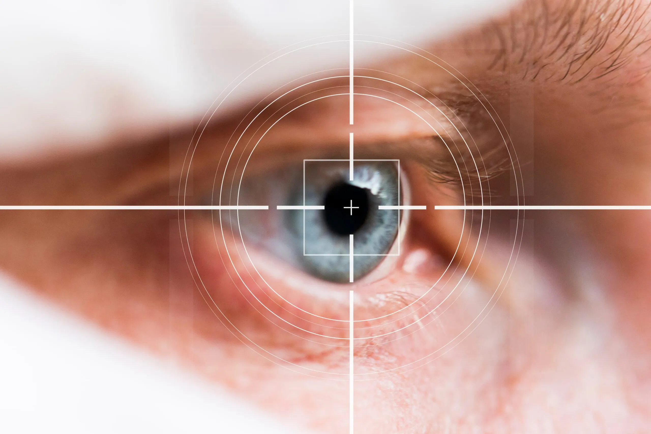 Close view of the eye with a focus target