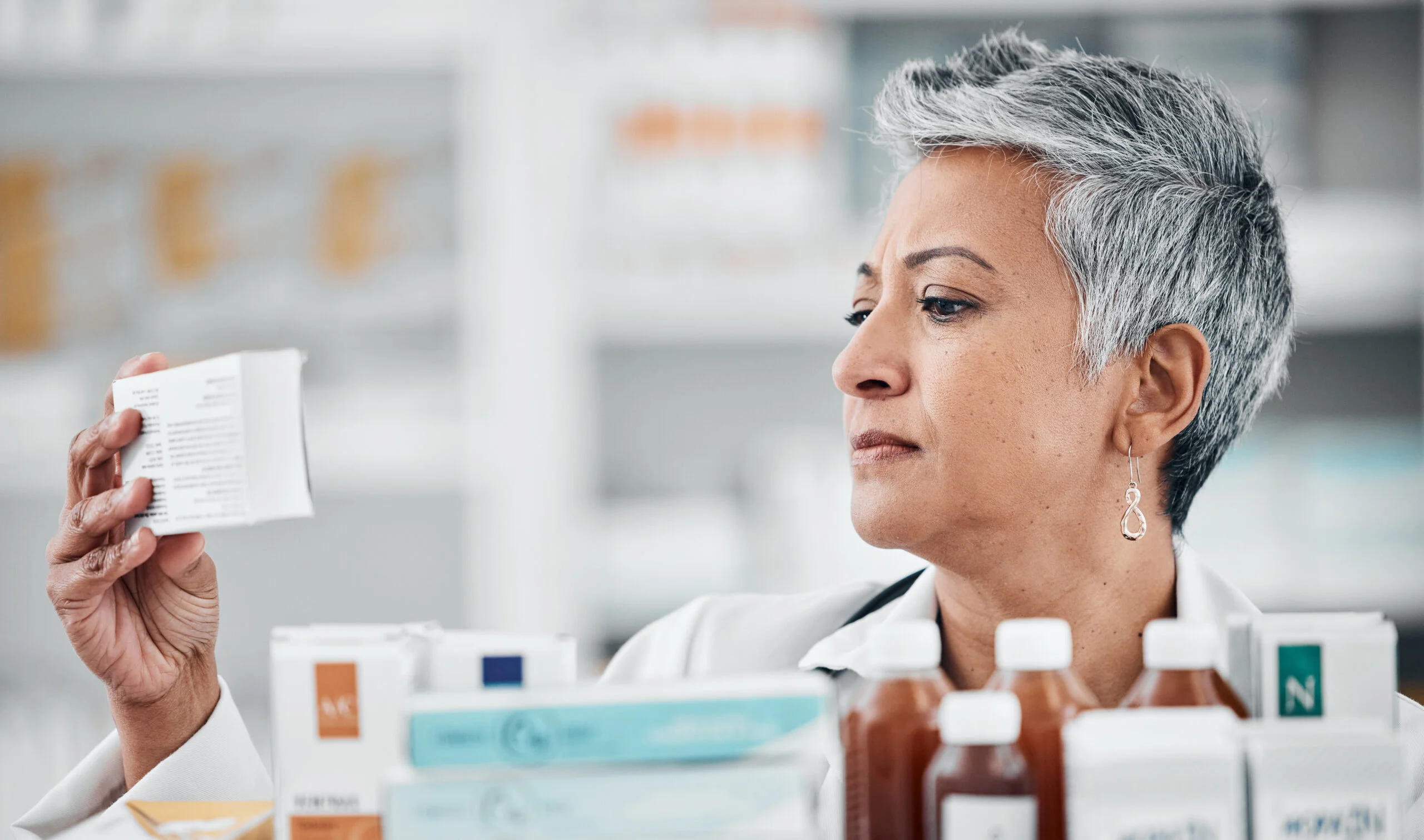 Woman having difficulty reading small print