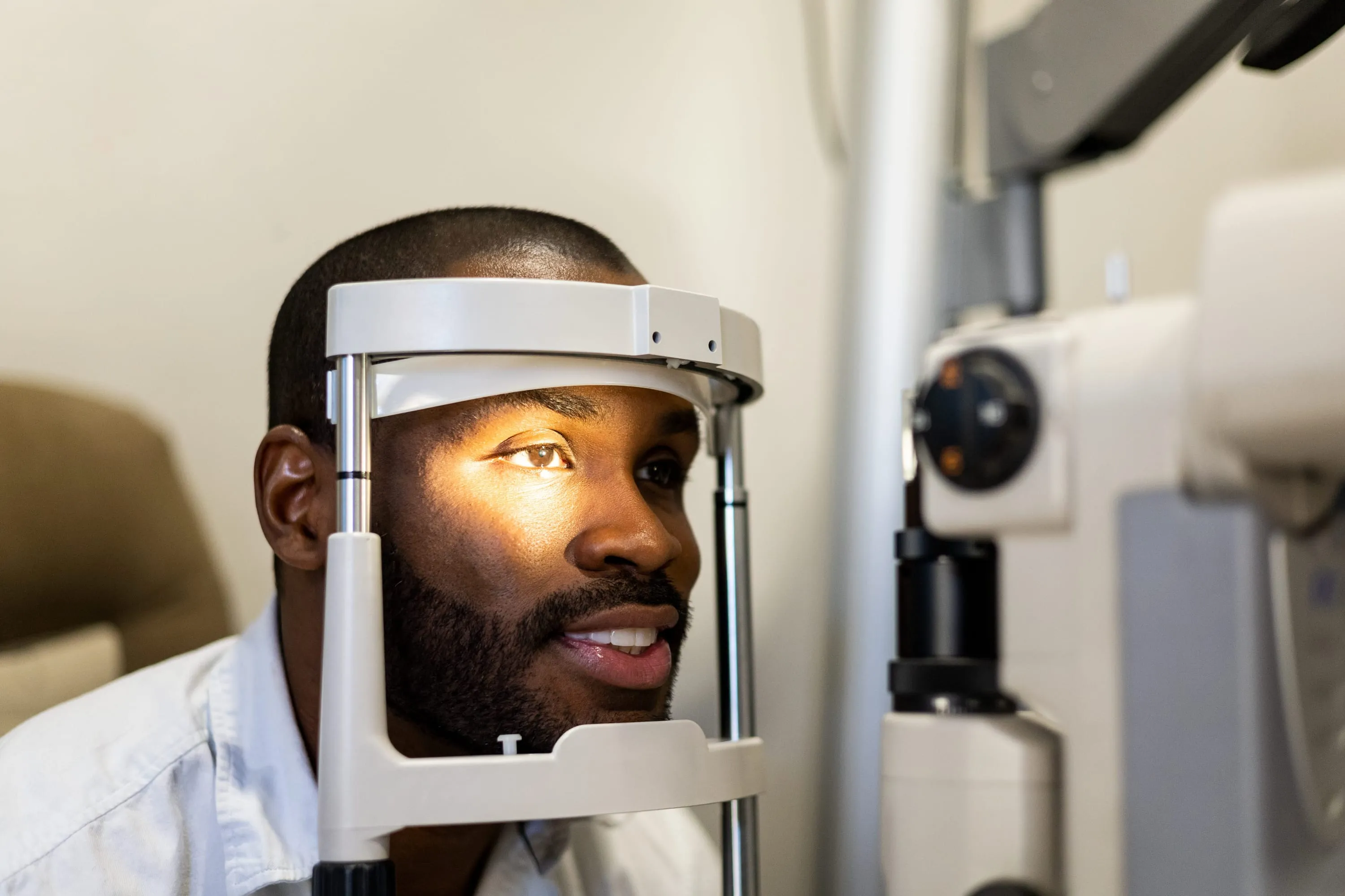 Doctor examining a patient at the slit lamp