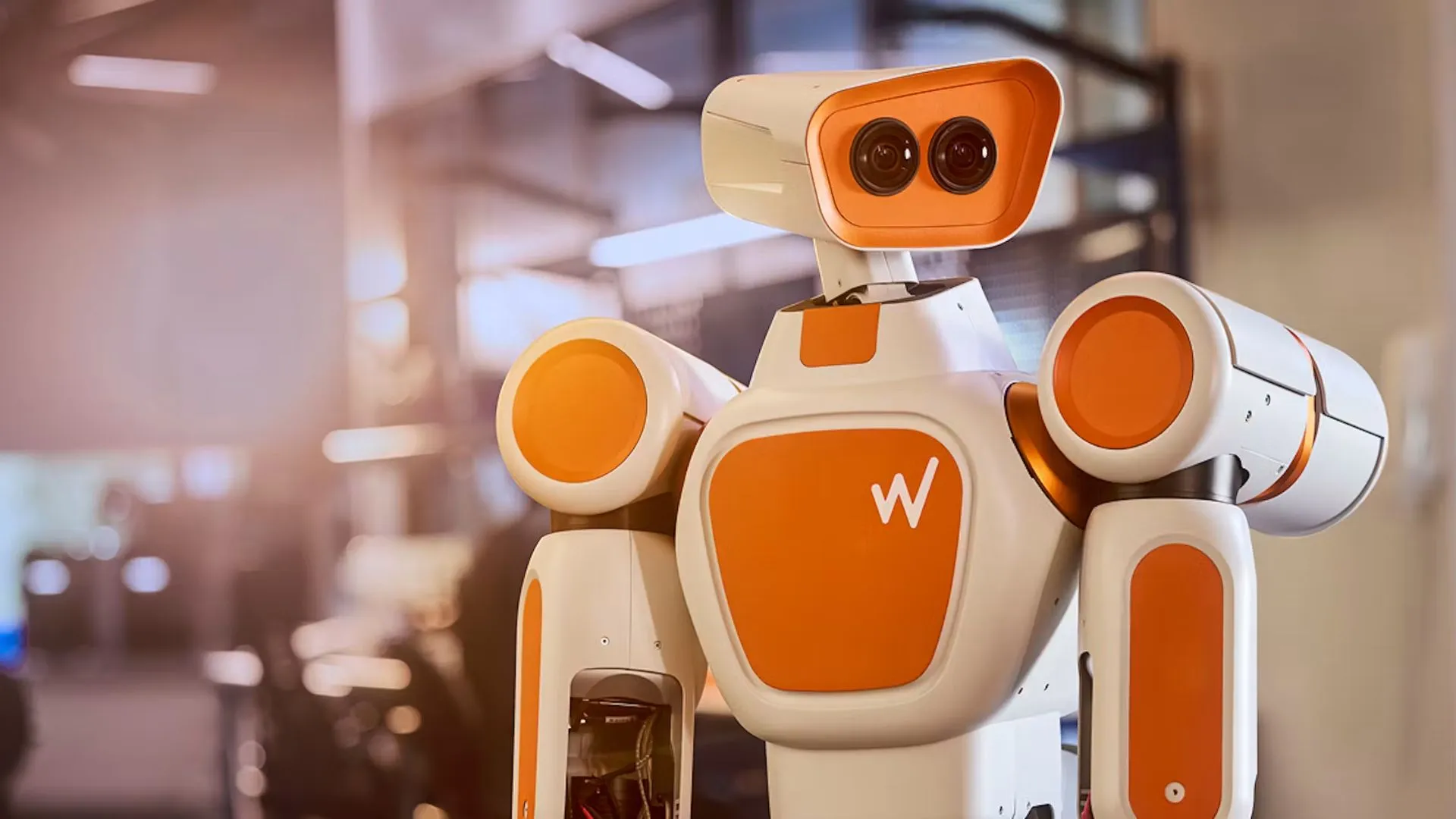 A humanoid service robot standing on a shop floor