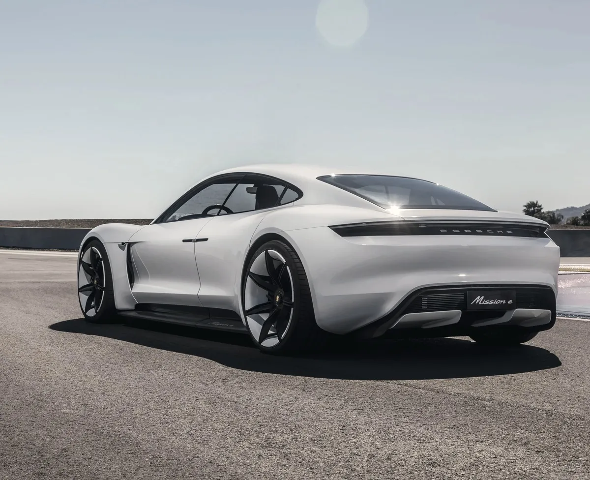 A Porsche Taycan on a coastal test track