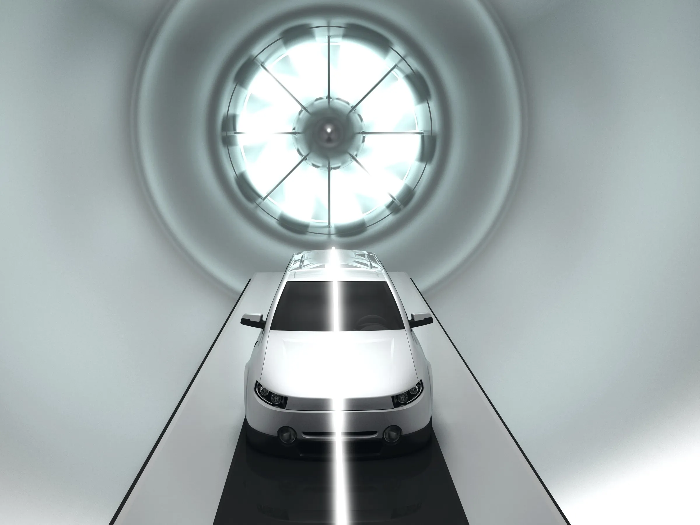 A prototype vehicle facing the fan in a wind tunnel
