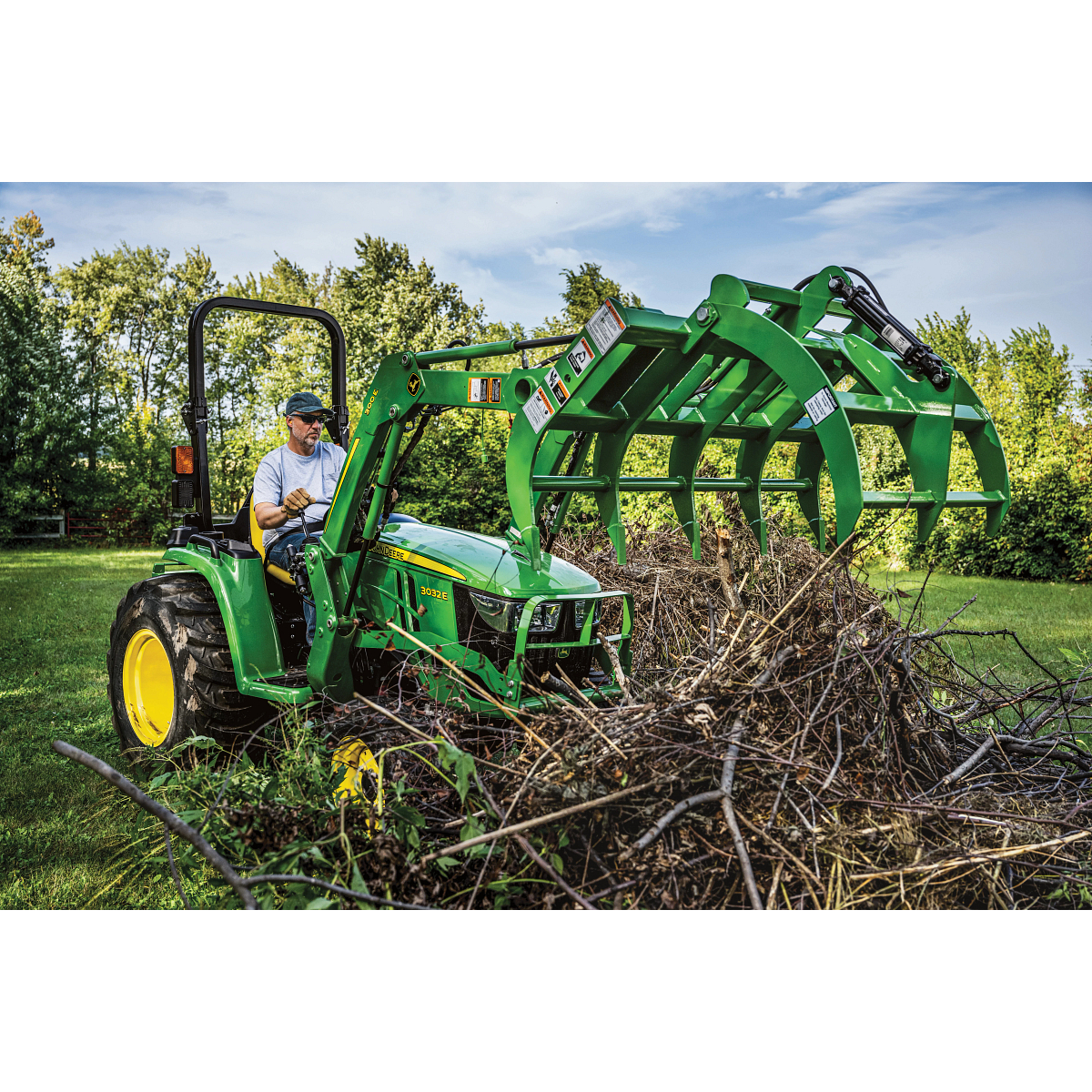 Utility Tractor with Root Grapple with Brush