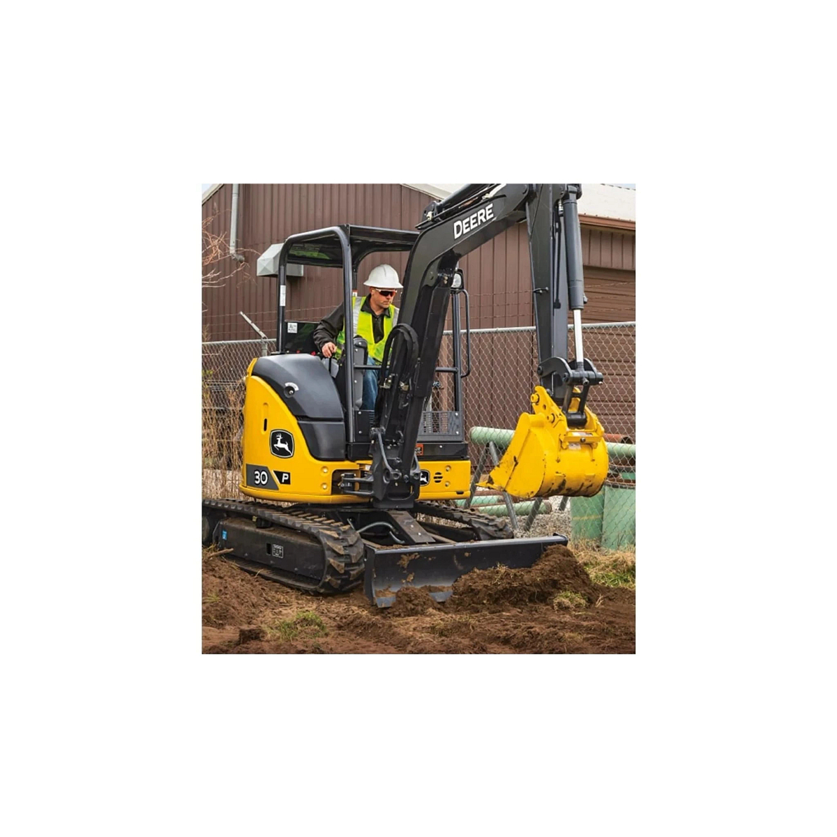 farmer operating a 30 P-Tier in a yard