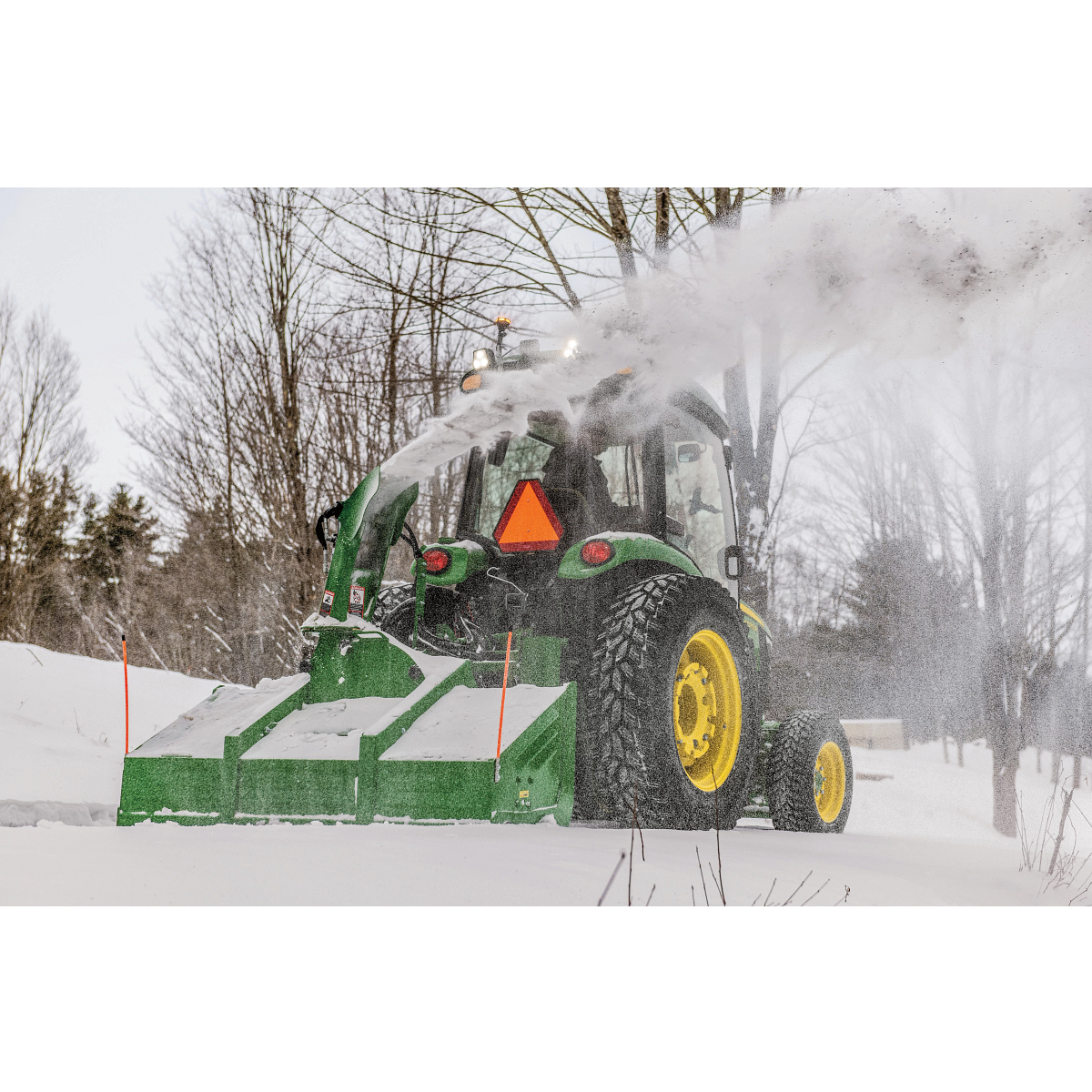 Blowing snow using a SB1174P Snowblower on 4075R Tractor