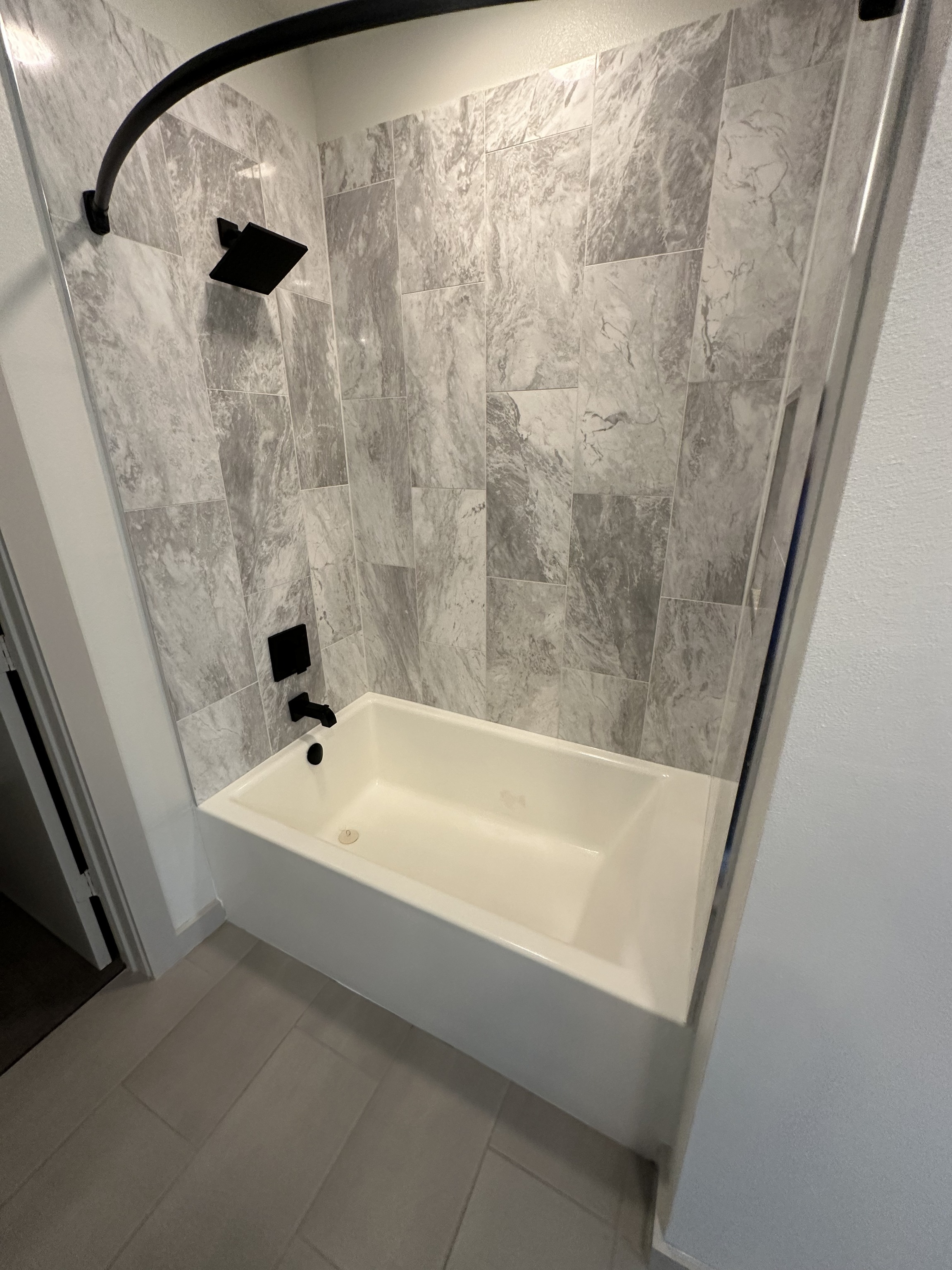 Marble Tub & Shower cleaned by Luxe Luxury Cleaning