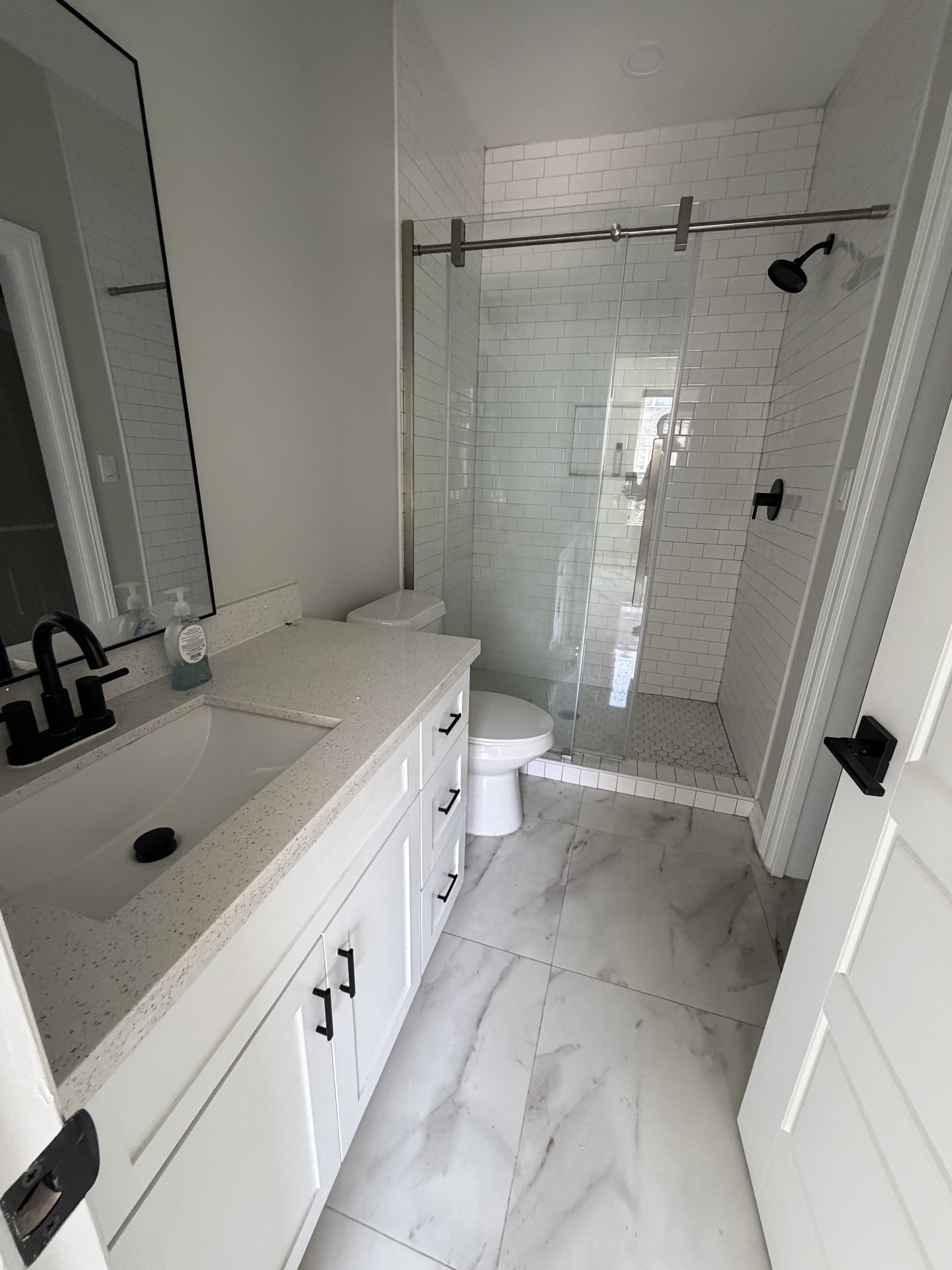Marble Shower cleaned by Luxe Luxury Cleaning