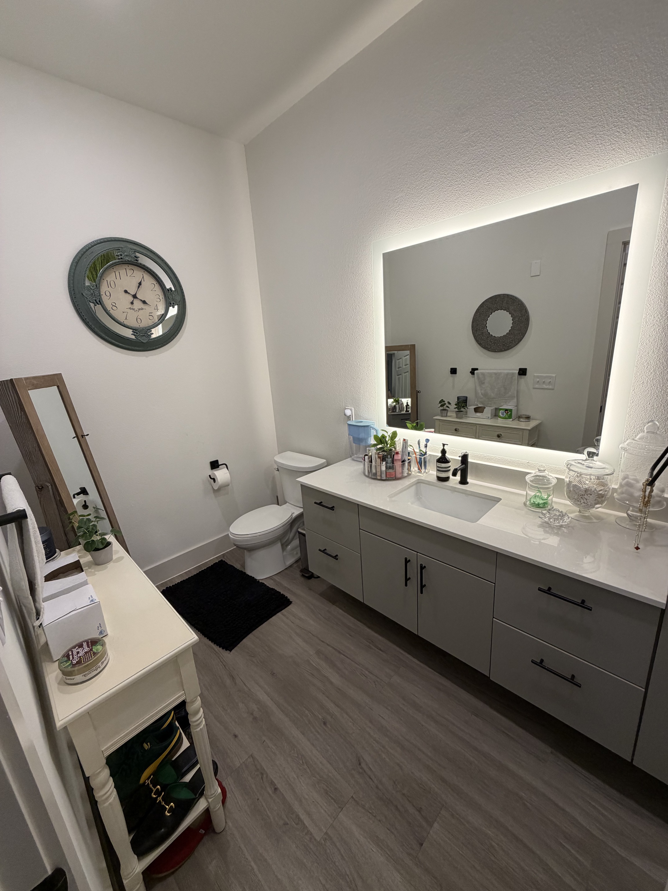 Lit Vanity Bath cleaned by Luxe Luxury Cleaning