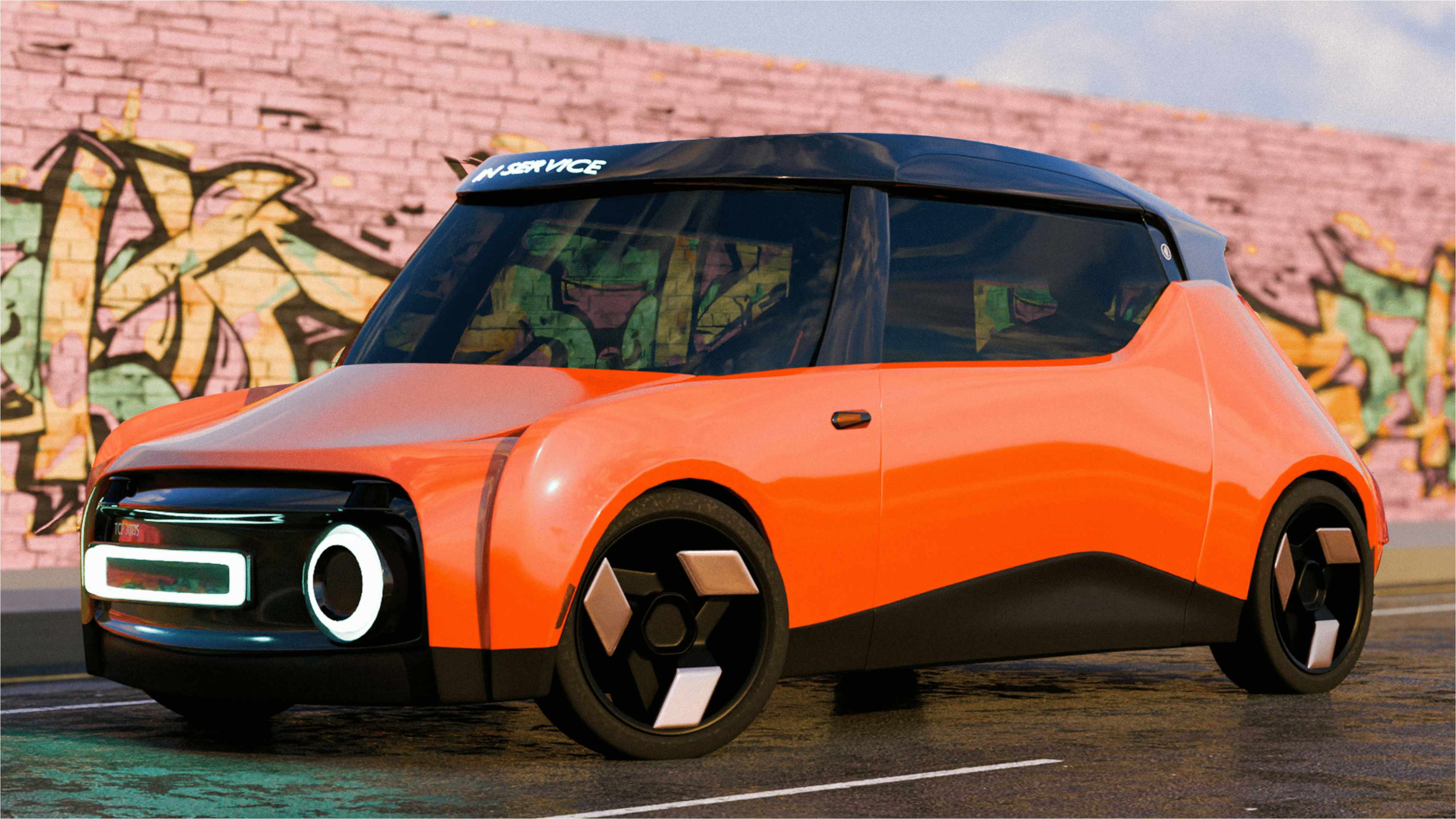 Orange futuristic compact car with black roof and unique geometric wheels parked near a graffiti wall.