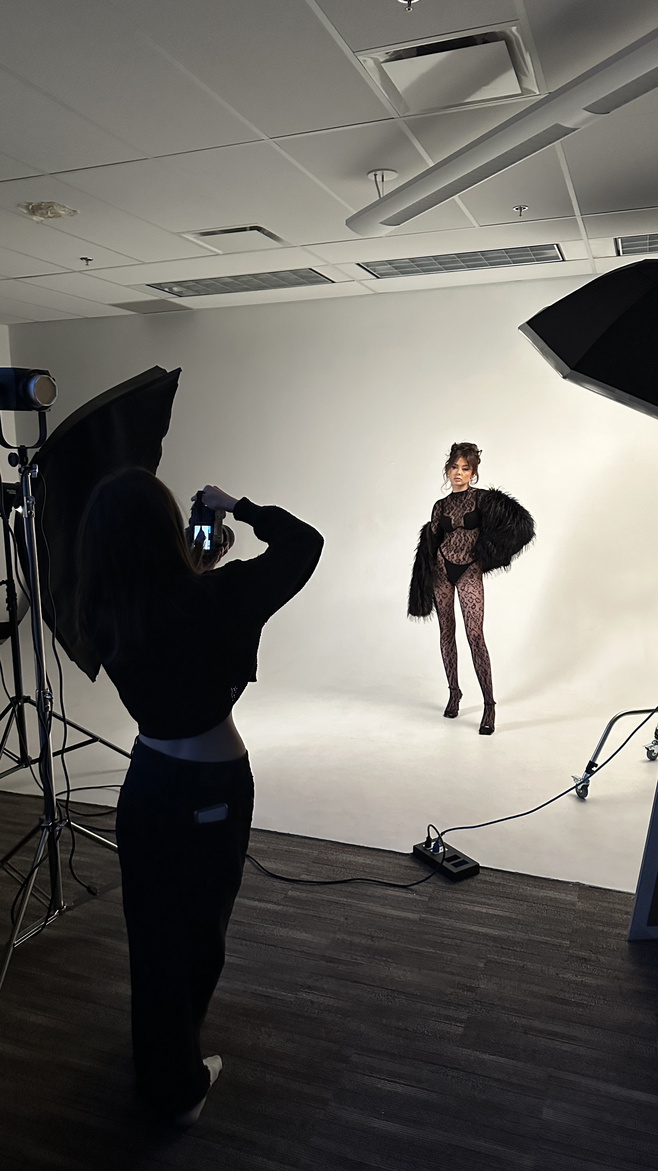 Photographer working with a client during the session 