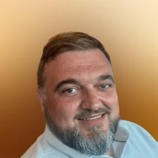 Porträtfoto von Tom Oates