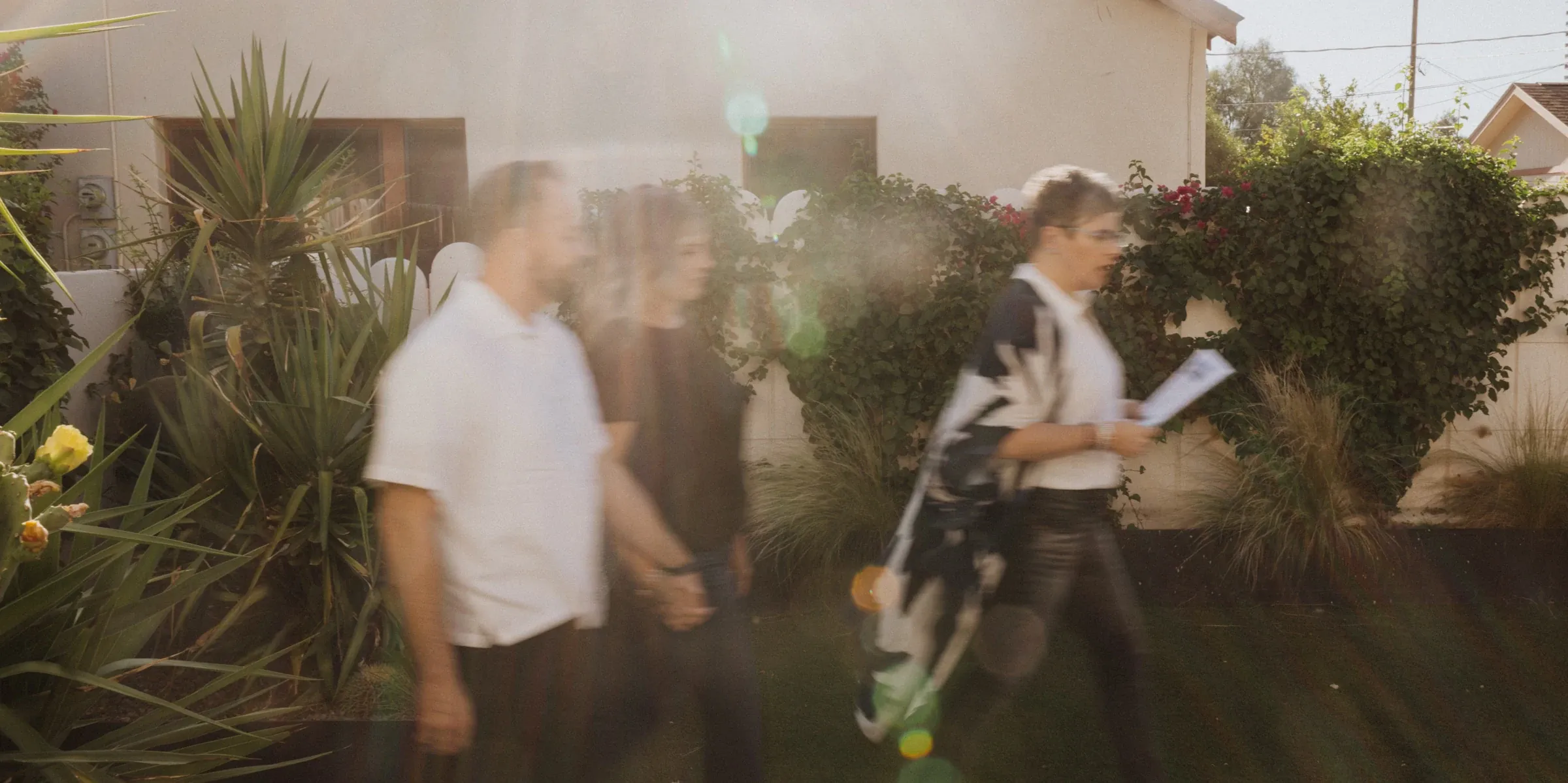 Real estate agent walking clients through a home showing