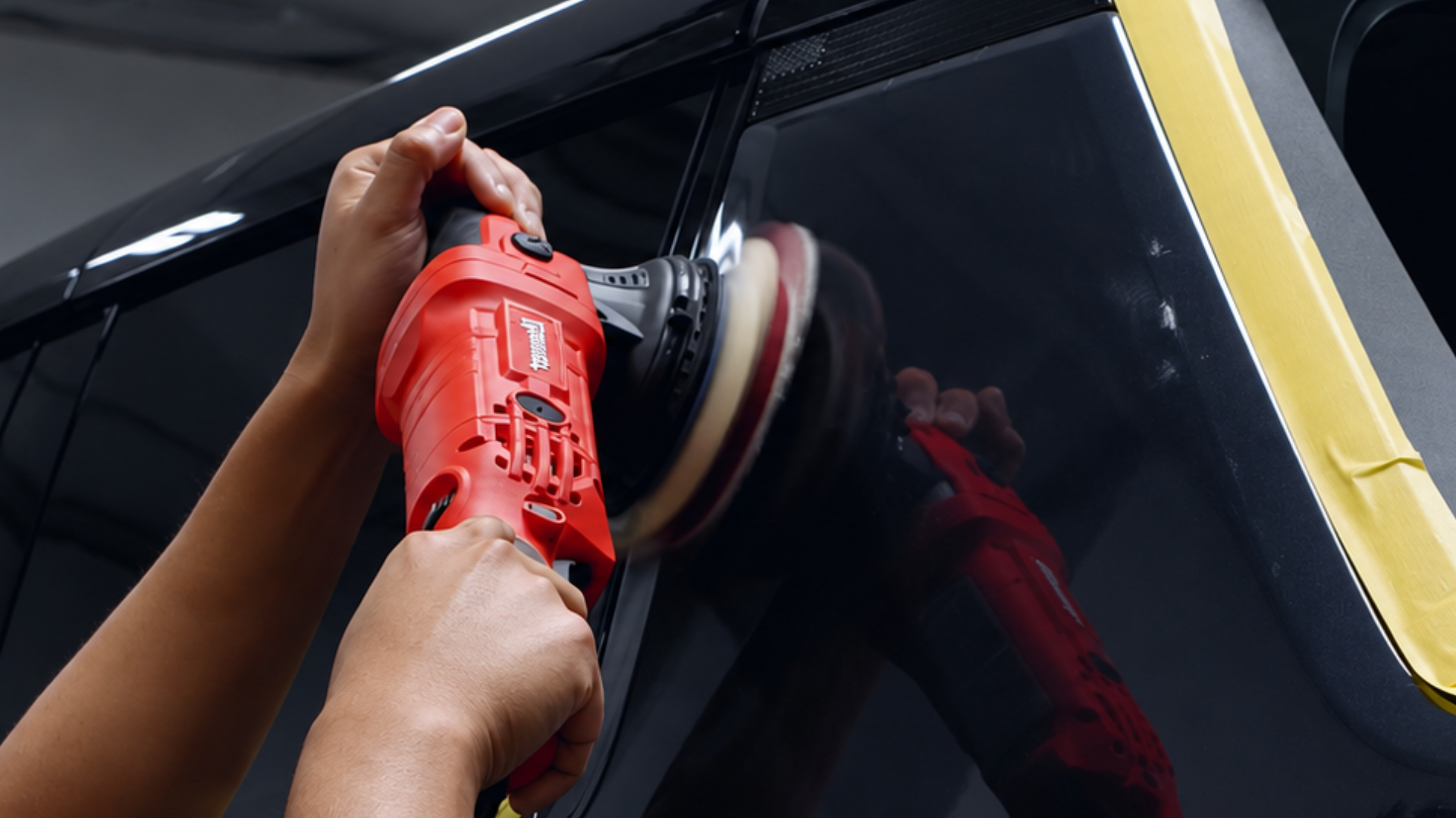 Professional paint correction and polishing on a vehicle