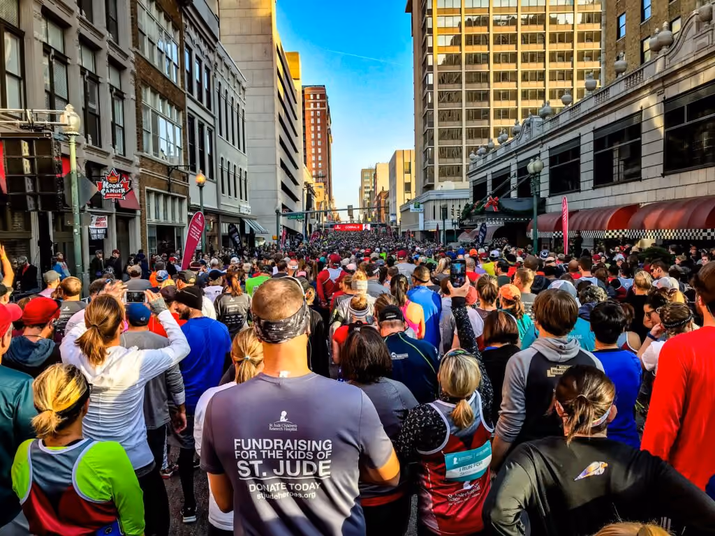 Fundraising college events - large group of people gathered on the street for a sponsored run