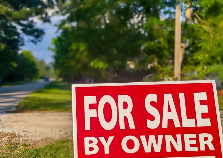 Rental property owner comparing whether to sell or keep a rental property