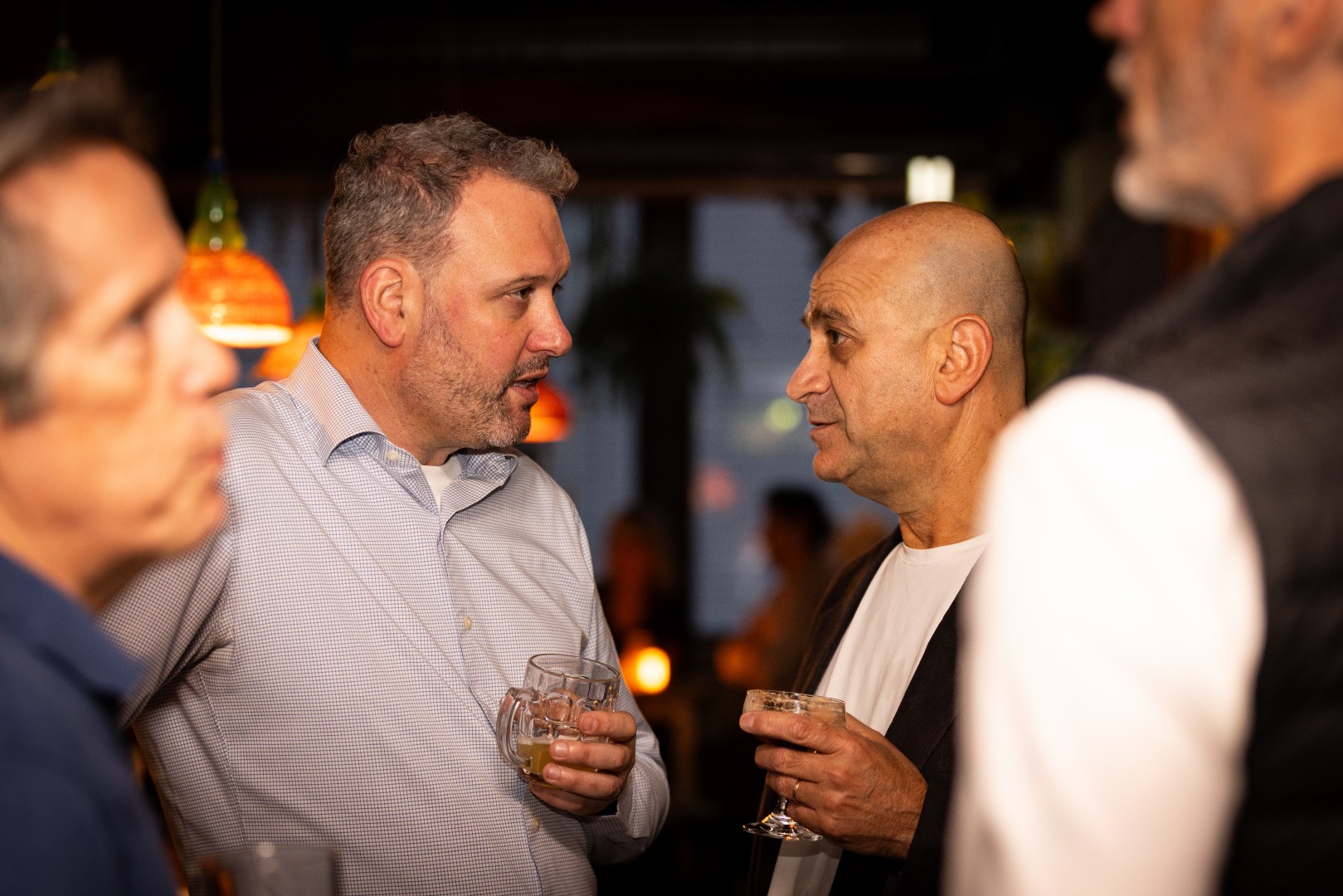Guests in conversation at the Canopy launch, Bomba Rooftop Bar, Melbourne