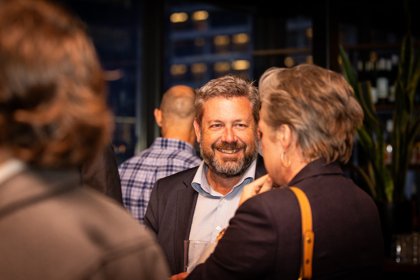 Guests in conversation at the Canopy launch, Bomba Rooftop Bar, Melbourne