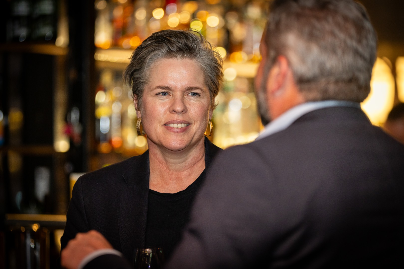 Guests in conversation at the Canopy launch, Bomba Rooftop Bar, Melbourne