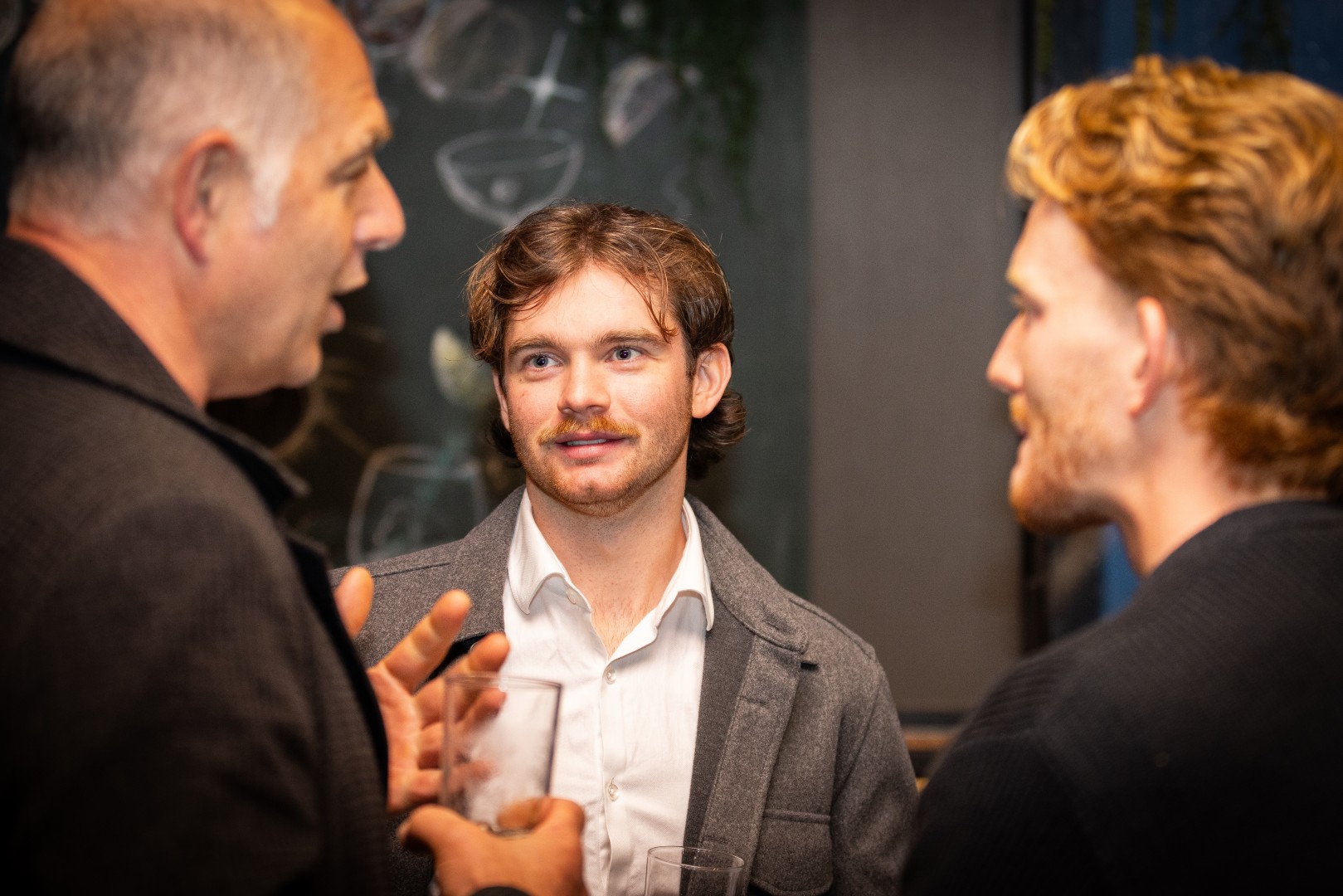 Guests in conversation at the Canopy launch, Bomba Rooftop Bar, Melbourne
