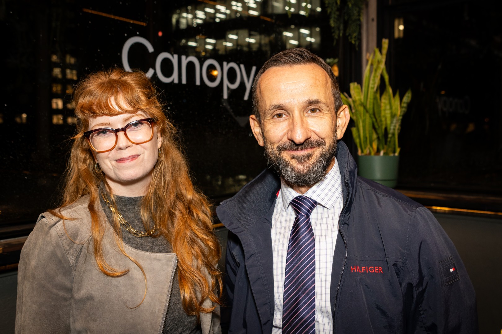 Guests in front of the Canopy logo window at the Canopy launch, Bomba Rooftop Bar, Melbourne