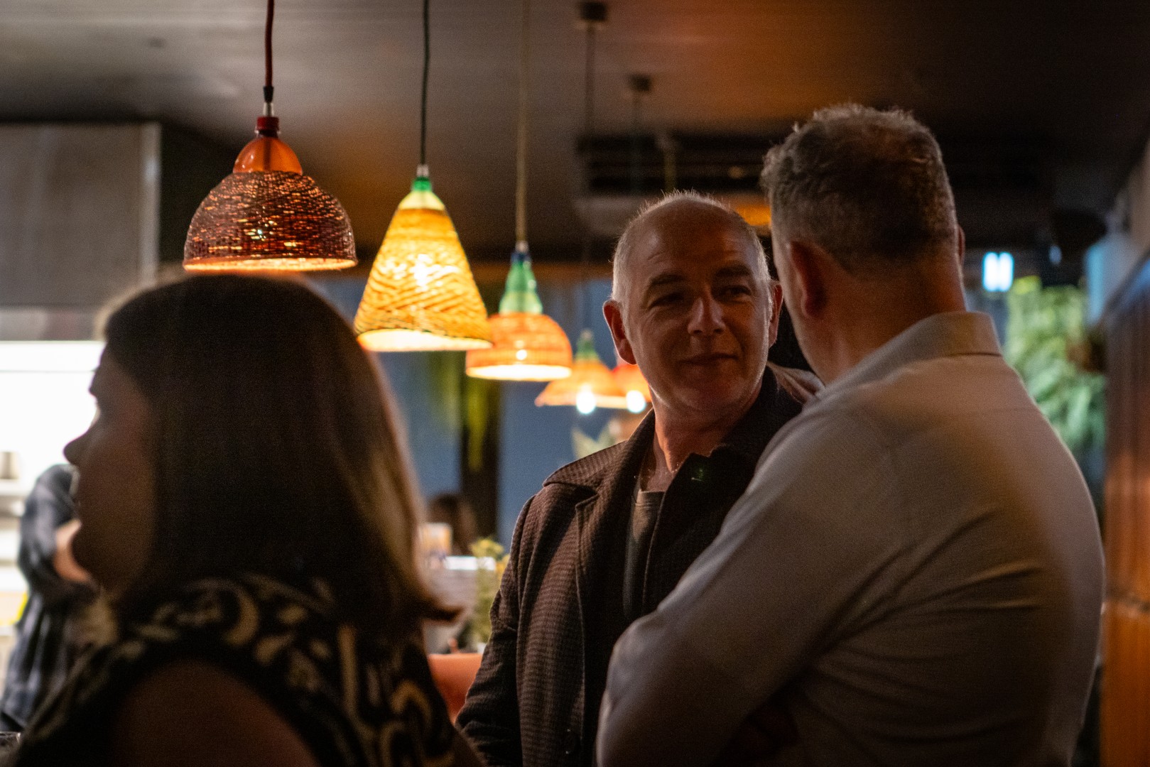Guests in conversation at the Canopy launch, Bomba Rooftop Bar, Melbourne
