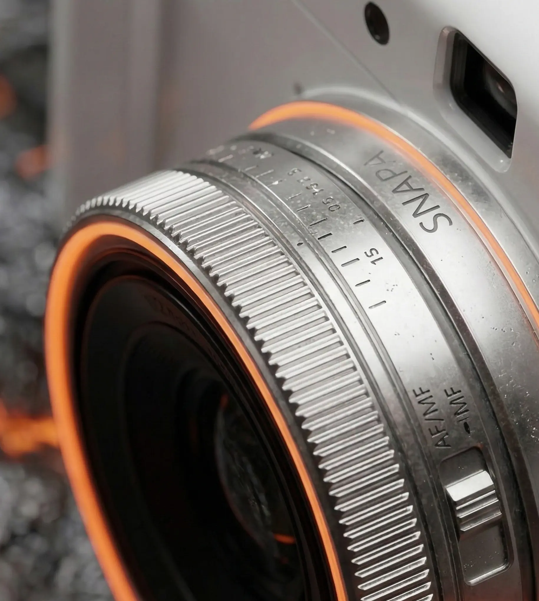 Snapa camera's sonar autofocus sensor