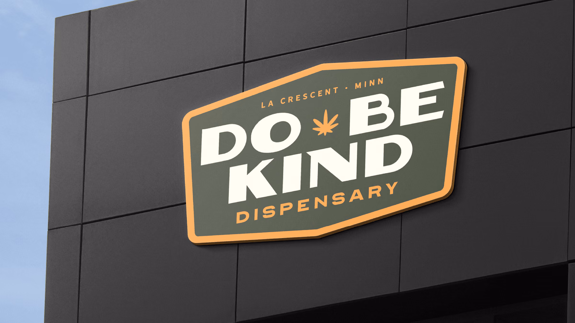 Do Be Kind Dispensary Logo On Building