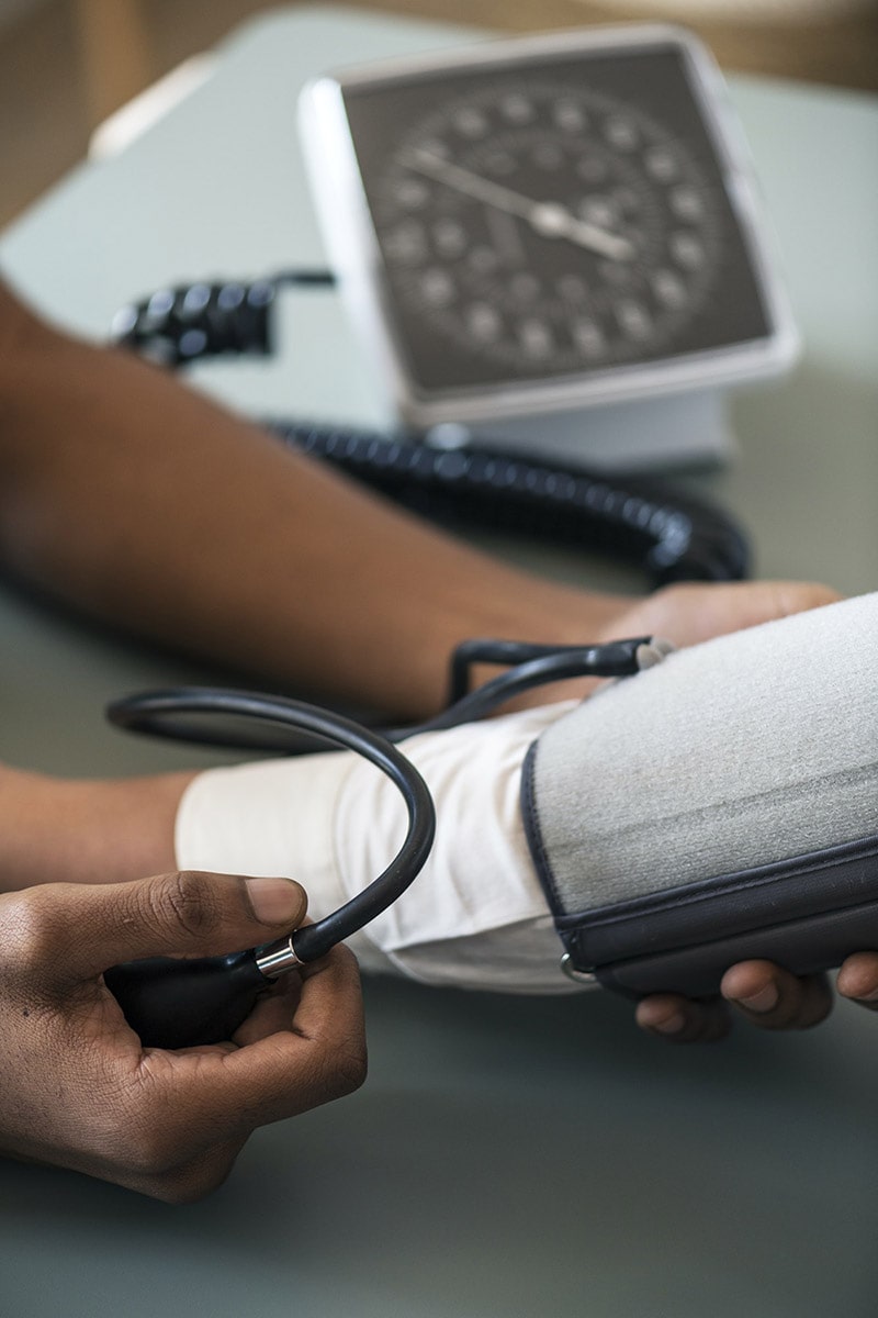 A Heartscope nurse fitting a blood pressure cuff
