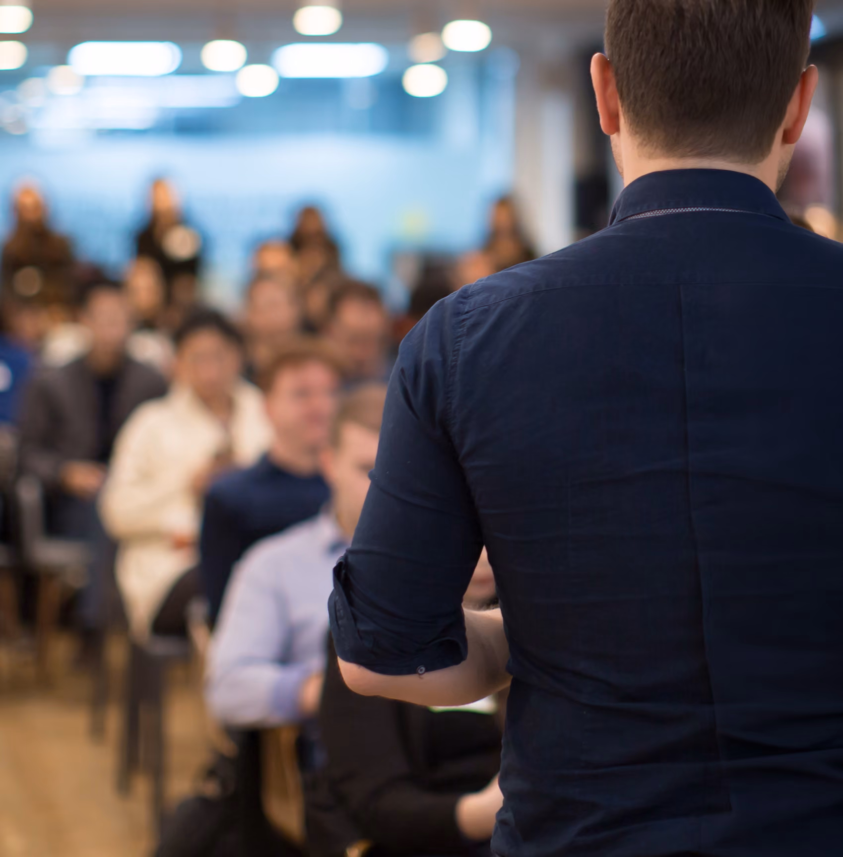 Cyber security consultant presenting at a conference