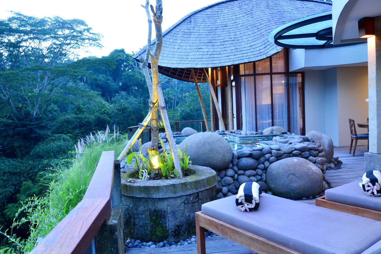 Royal Maha penthouse terrace with sunloungers beside the heated whirlpool